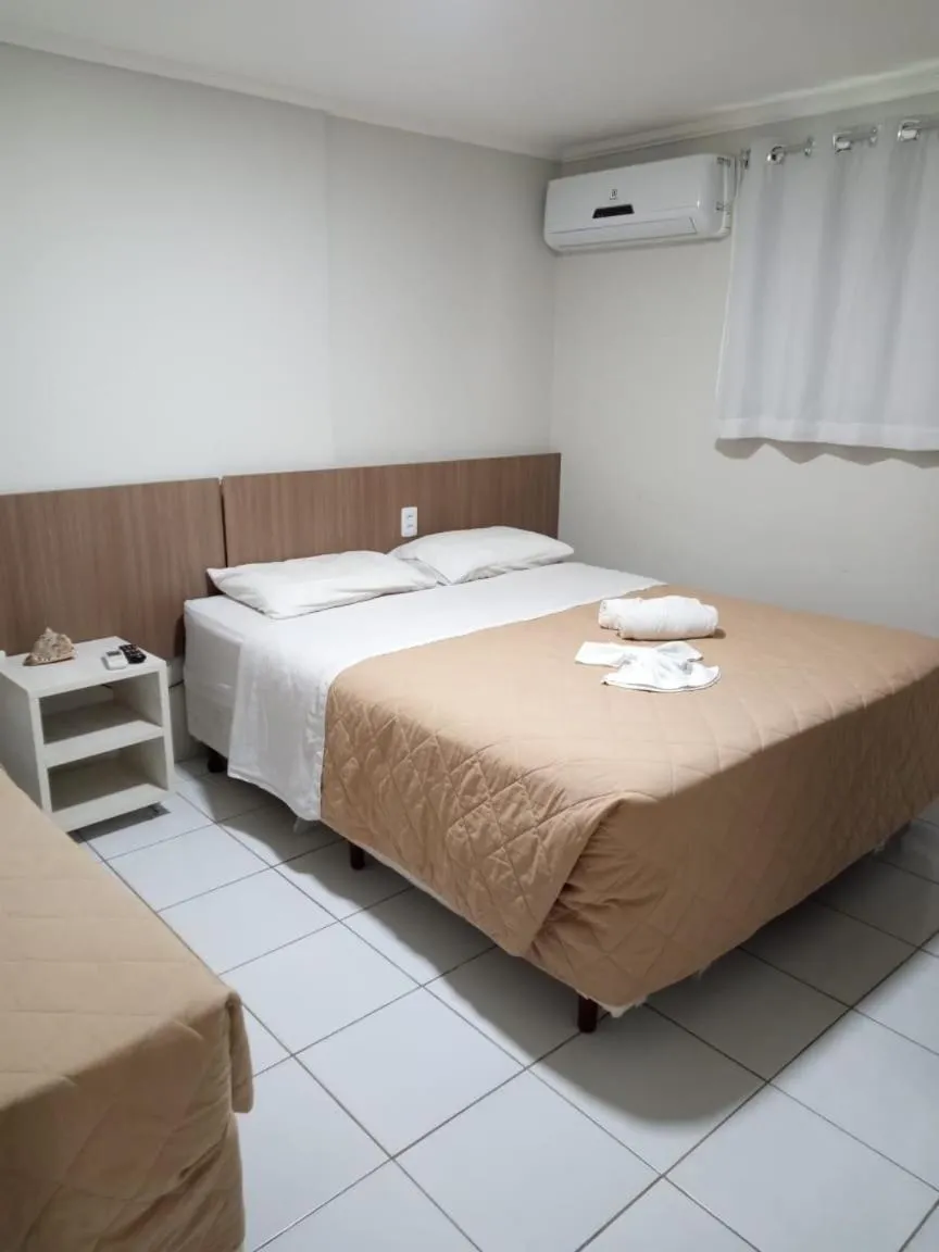 Bed in Pousada Boi Bumba Tambau