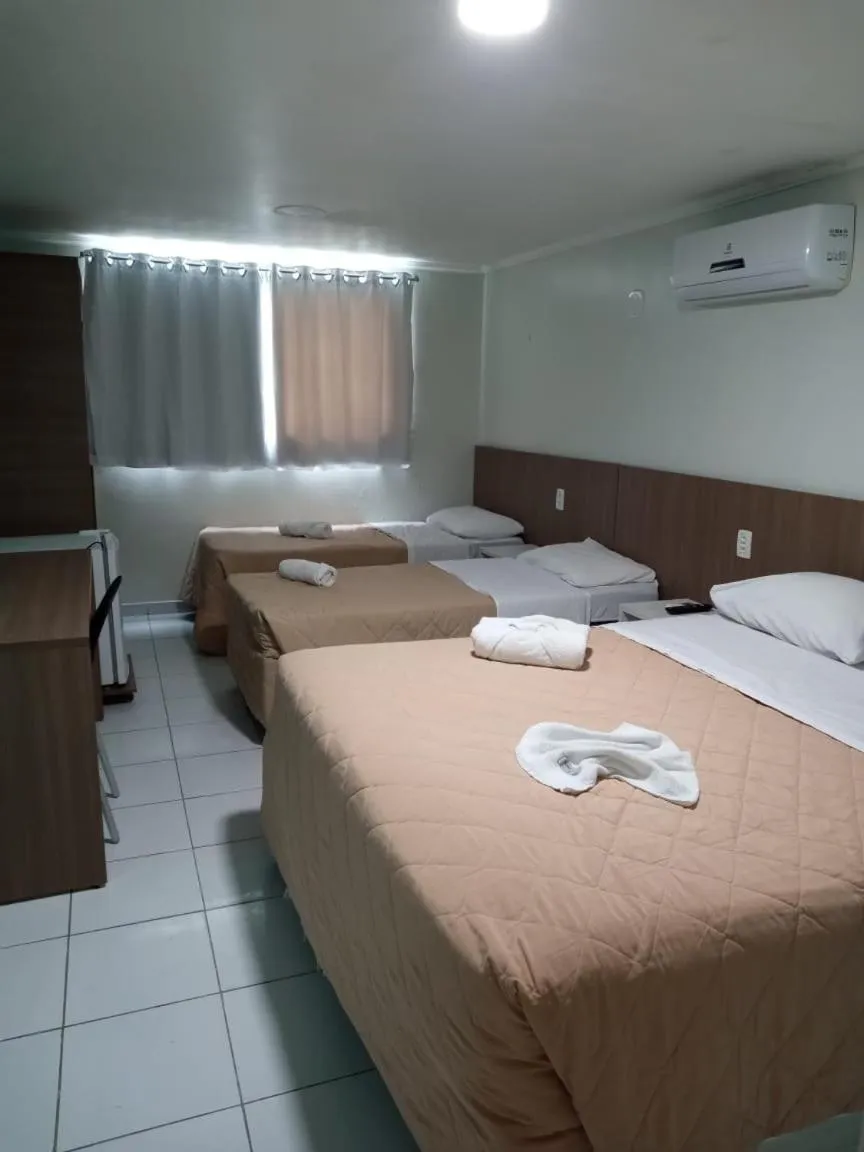 Bed in Pousada Boi Bumba Tambau