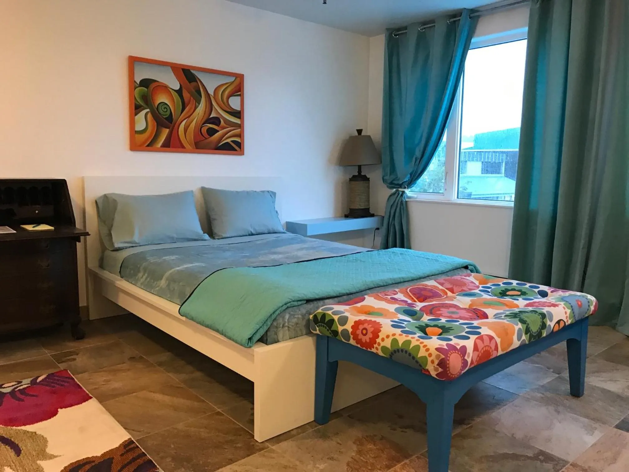 Bed in Aquamarine Suites