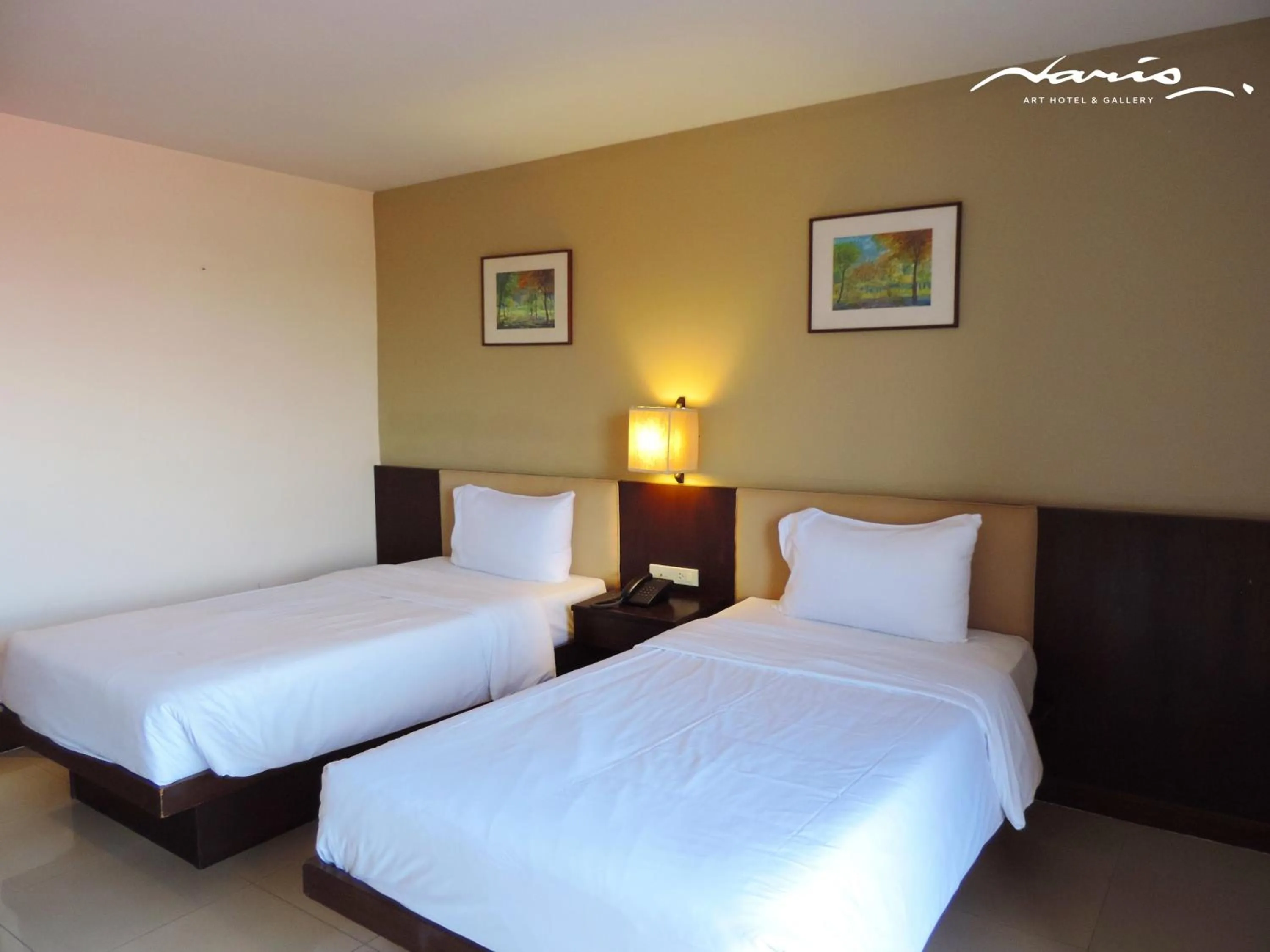 Bed in Naris Art Hotel