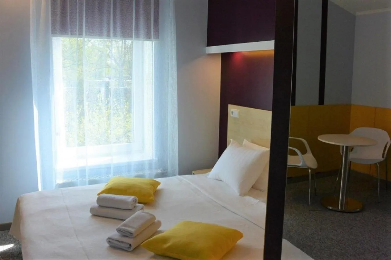 Photo of the whole room, Bed in Alba Hotel