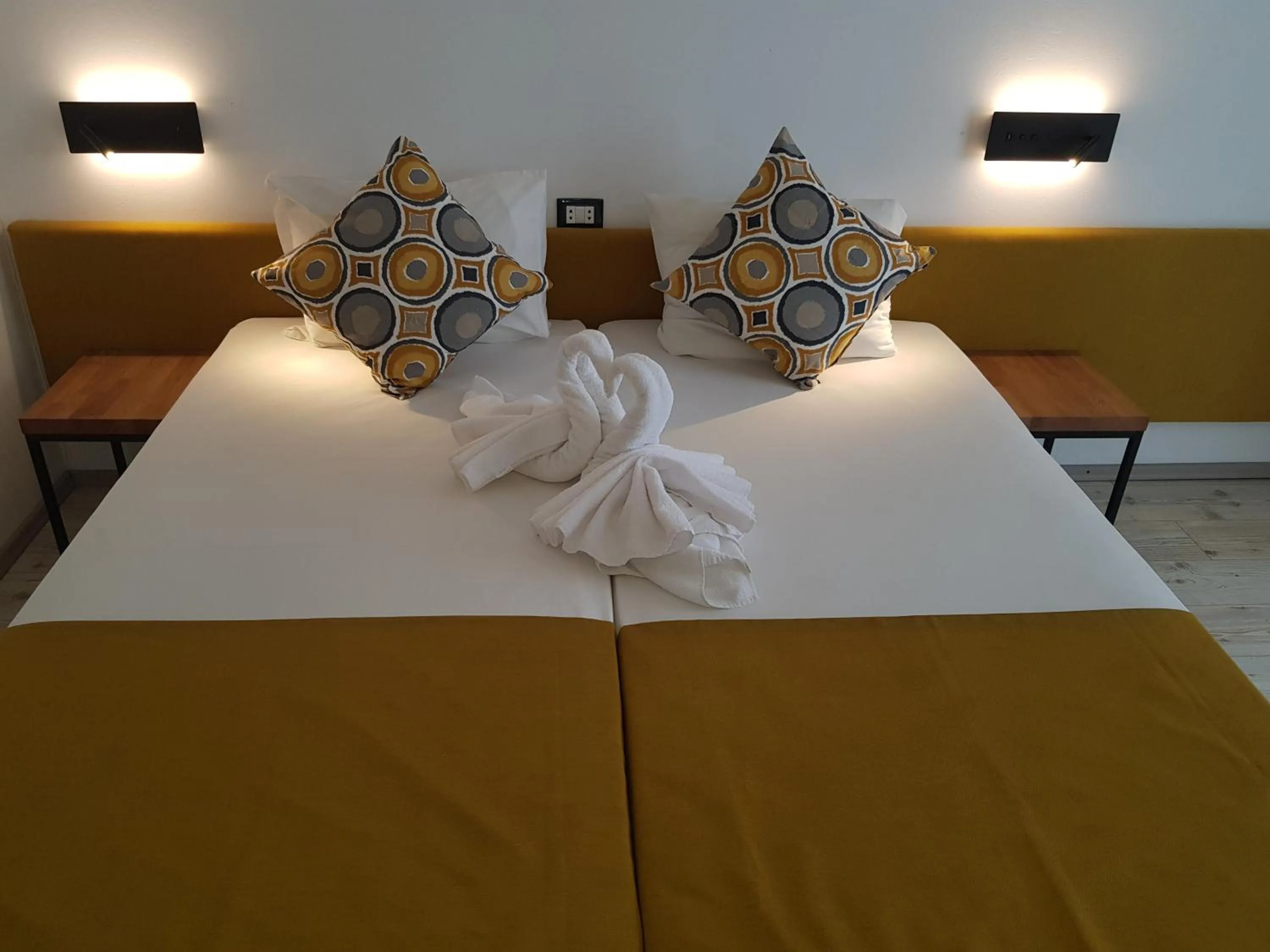 Bed in Tintyava Park Hotel