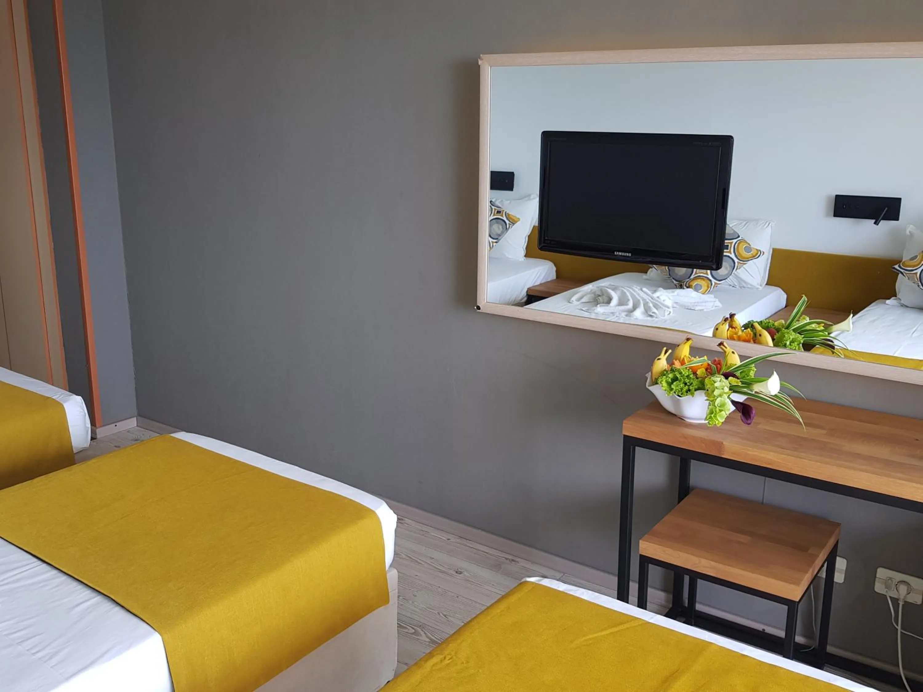 Bed in Tintyava Park Hotel