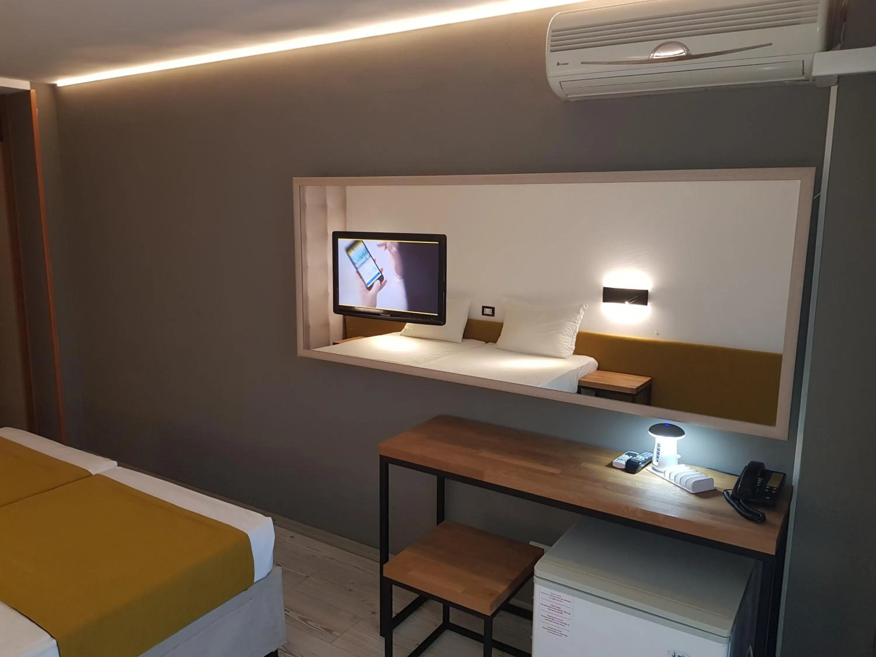 Bed in Tintyava Park Hotel