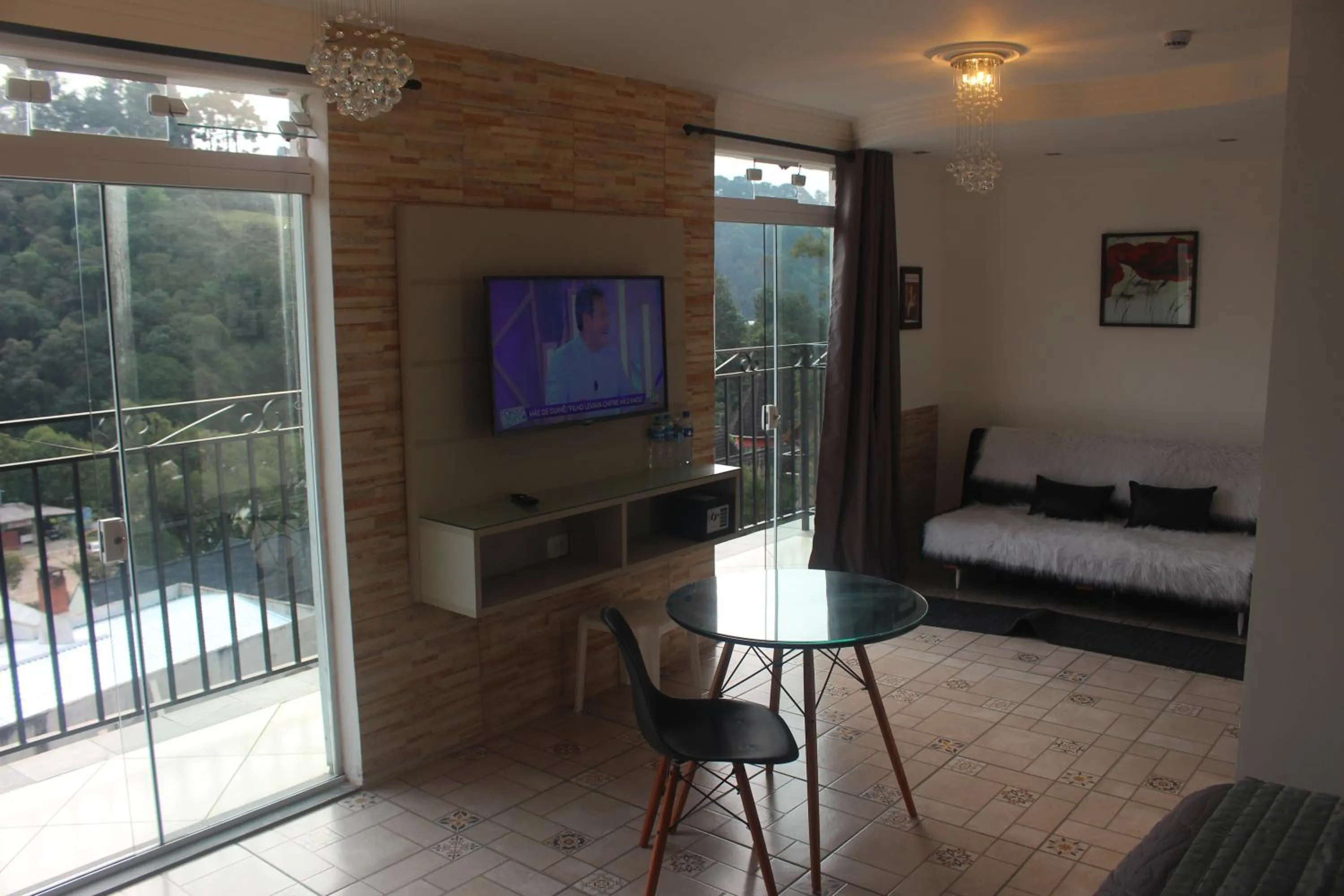 Communal lounge/ TV room in Casarão da Ducha hotel concept