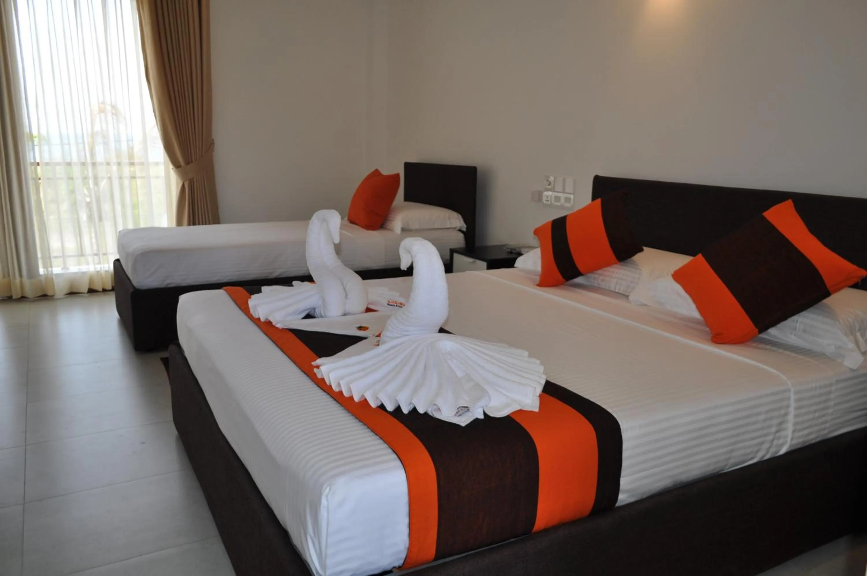 Bed in Amanda Beach Resort