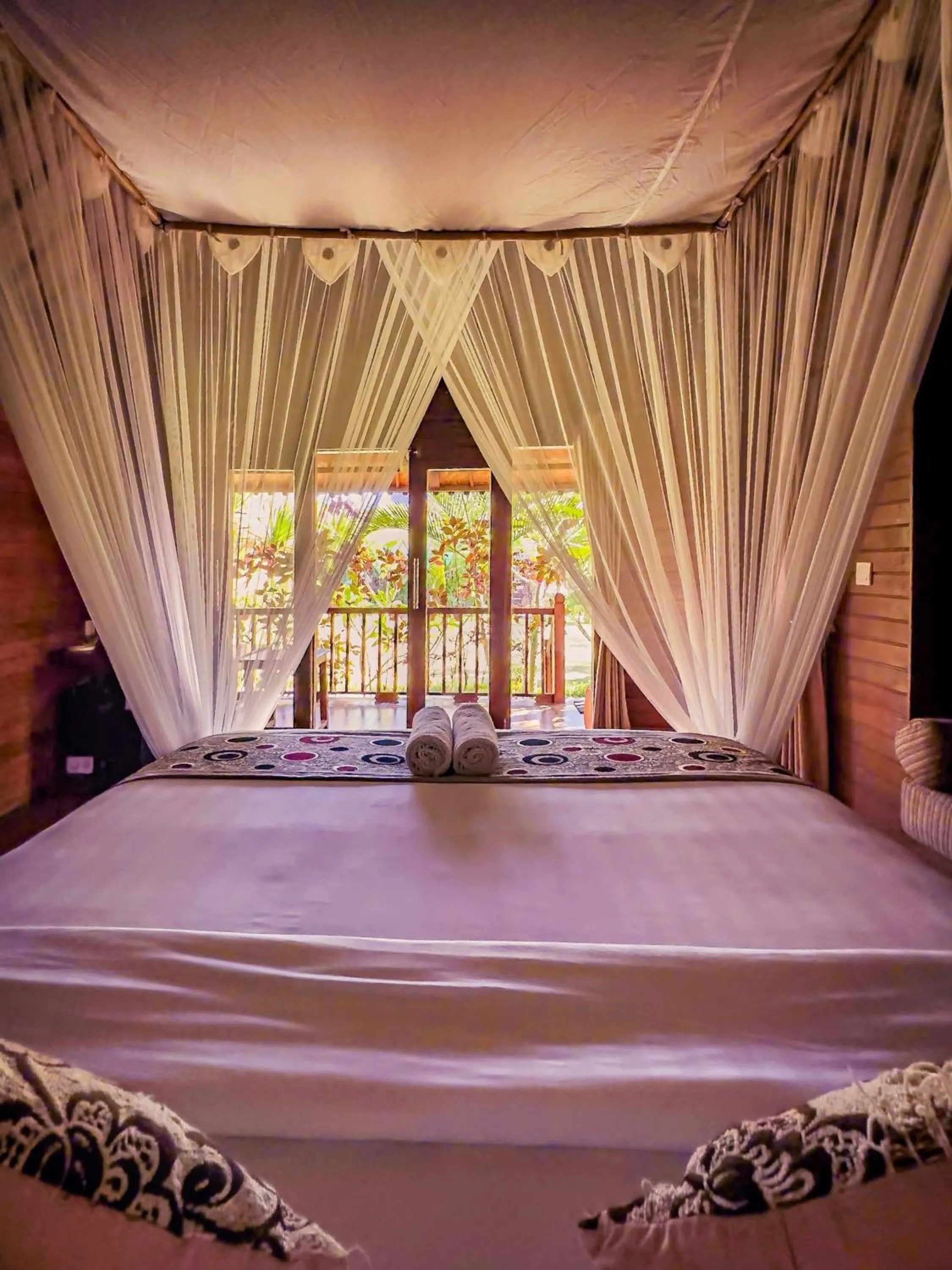 Bed in Island Garden Huts Lembongan