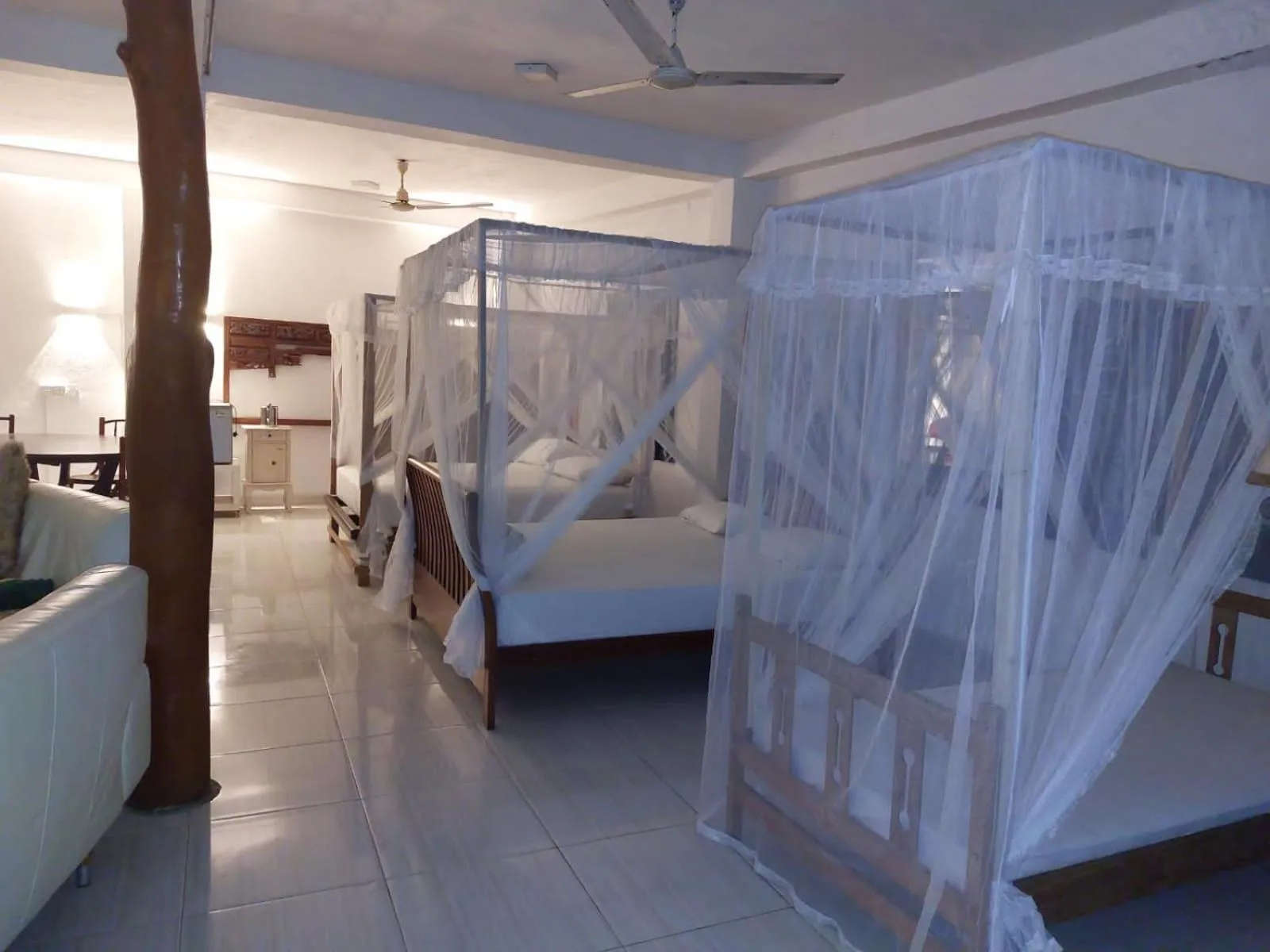 Bed in Blue Horizon Beach Hotel