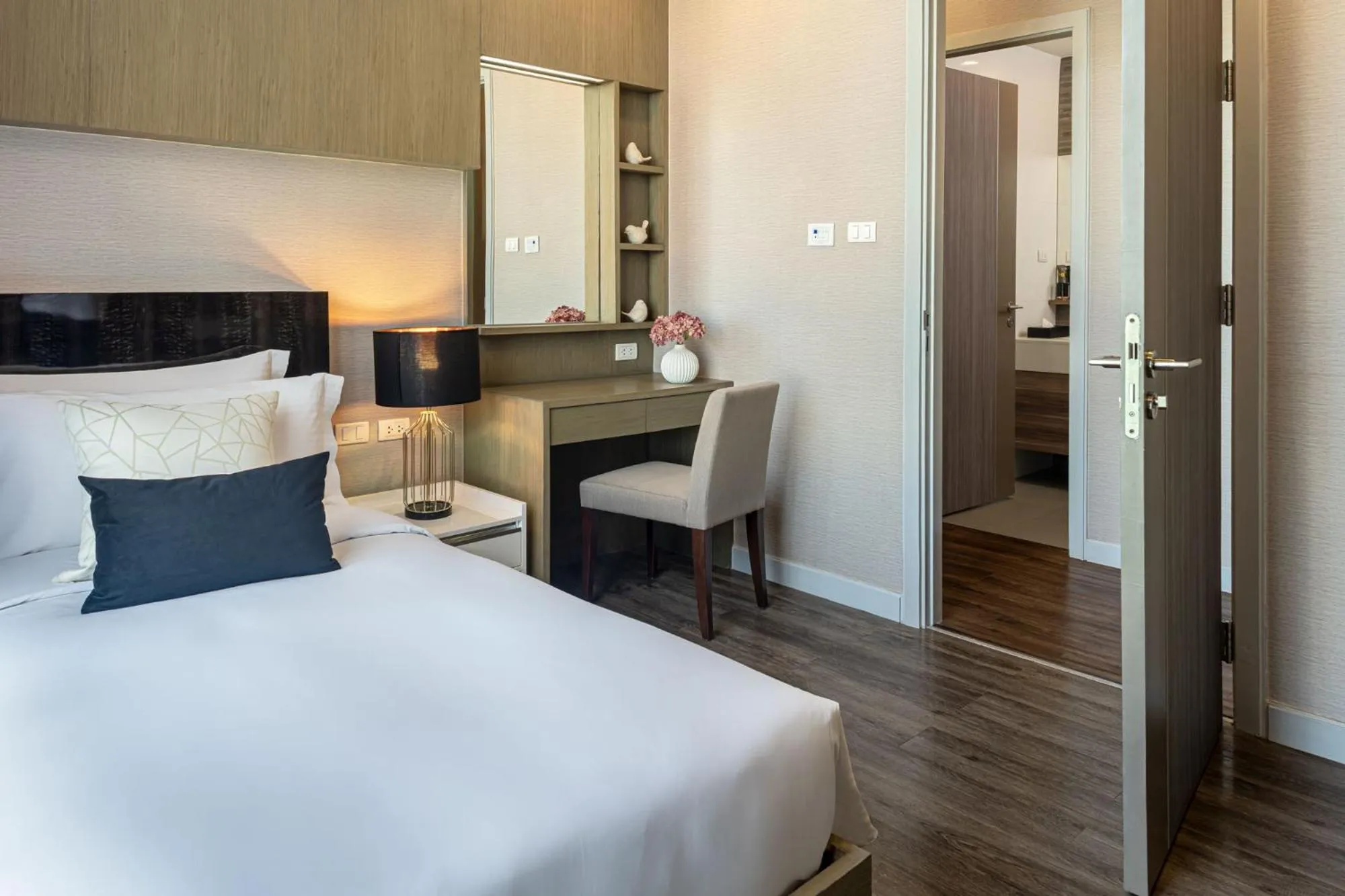 Bed in Metropolis Suites Bangkok, Tapestry Collection by Hilton