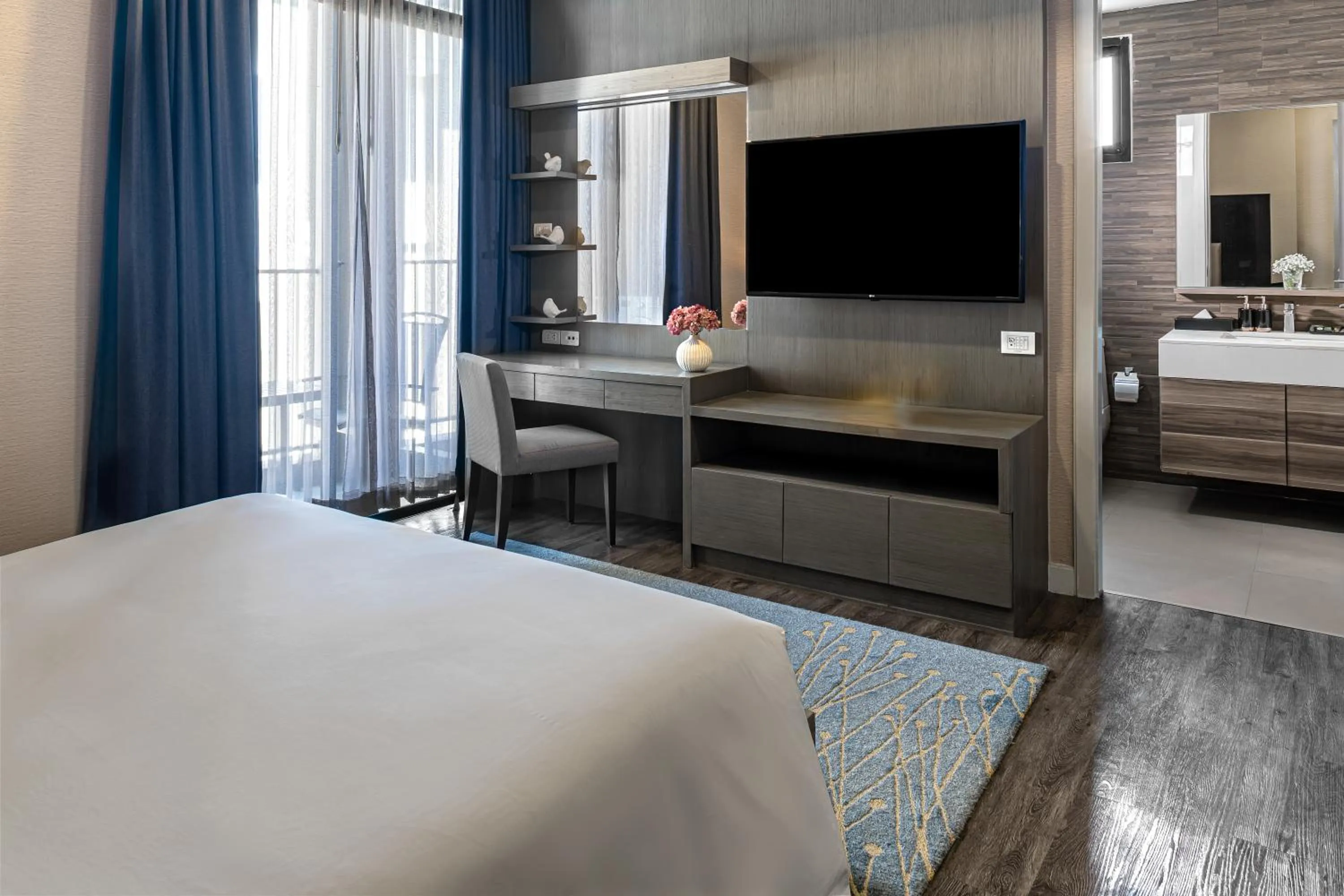 Bed in Metropolis Suites Bangkok, Tapestry Collection by Hilton