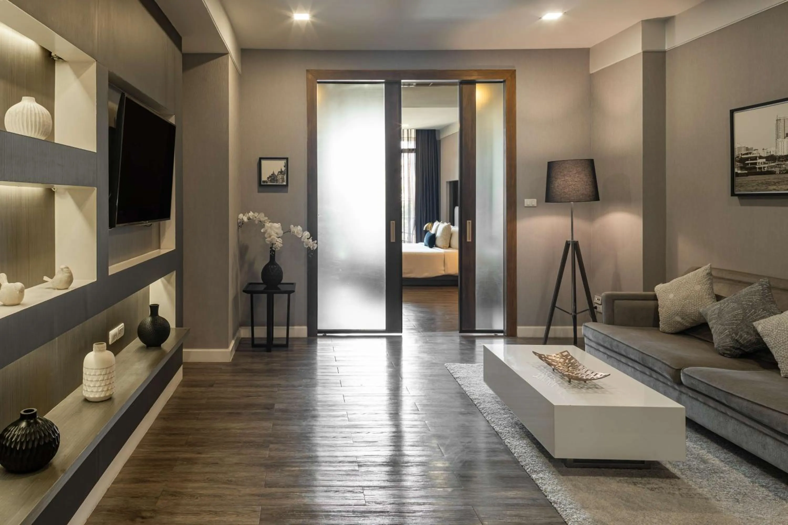 Living room in Metropolis Suites Bangkok, Tapestry Collection by Hilton