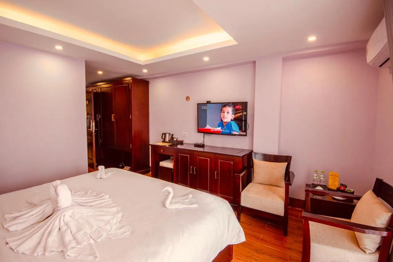 Bed in Le Bordeaux Sapa Hotel