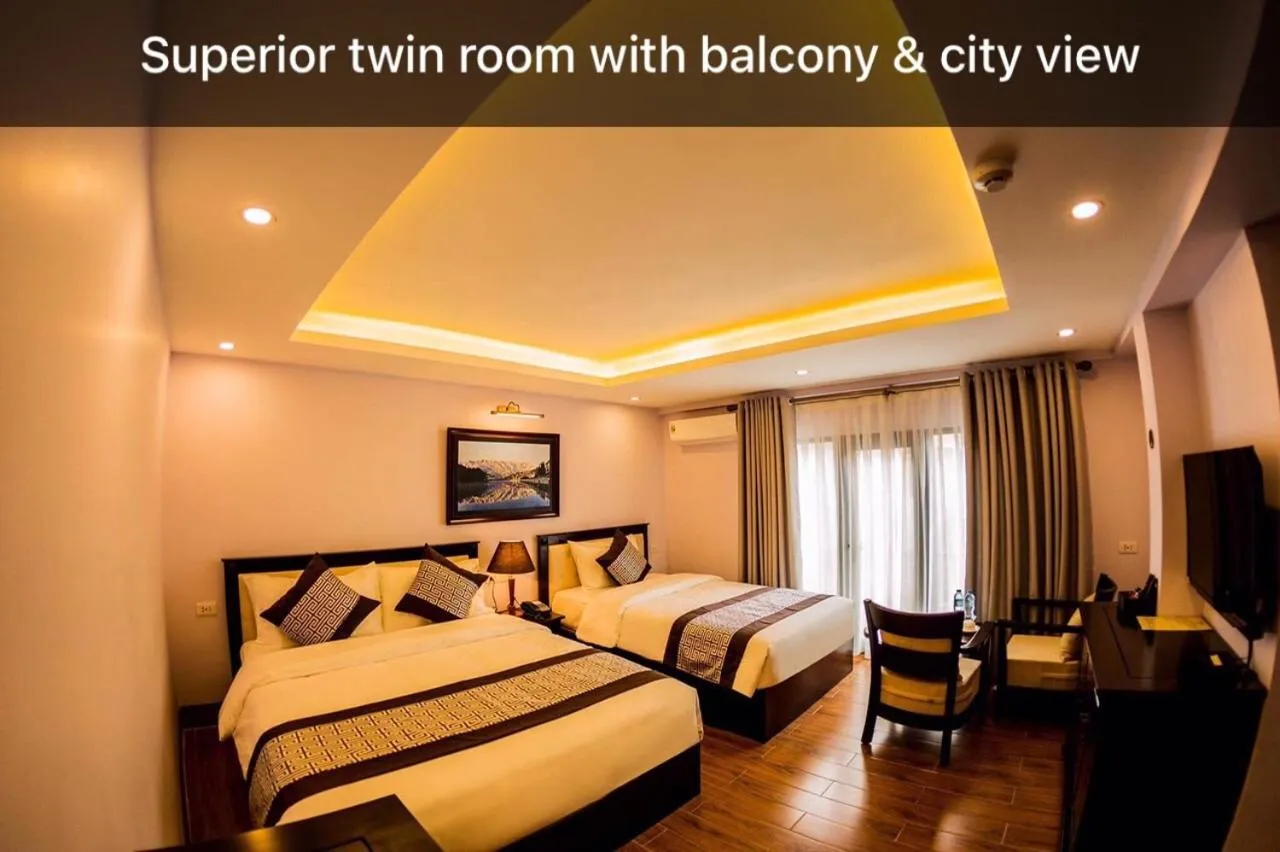 Bed in Le Bordeaux Sapa Hotel