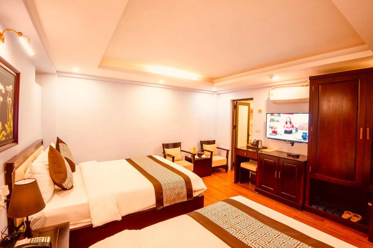 Bed in Le Bordeaux Sapa Hotel