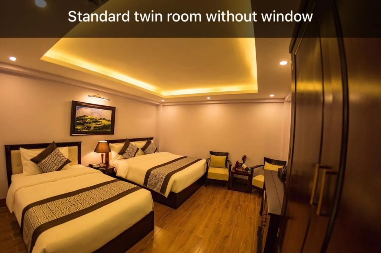 Bed in Le Bordeaux Sapa Hotel