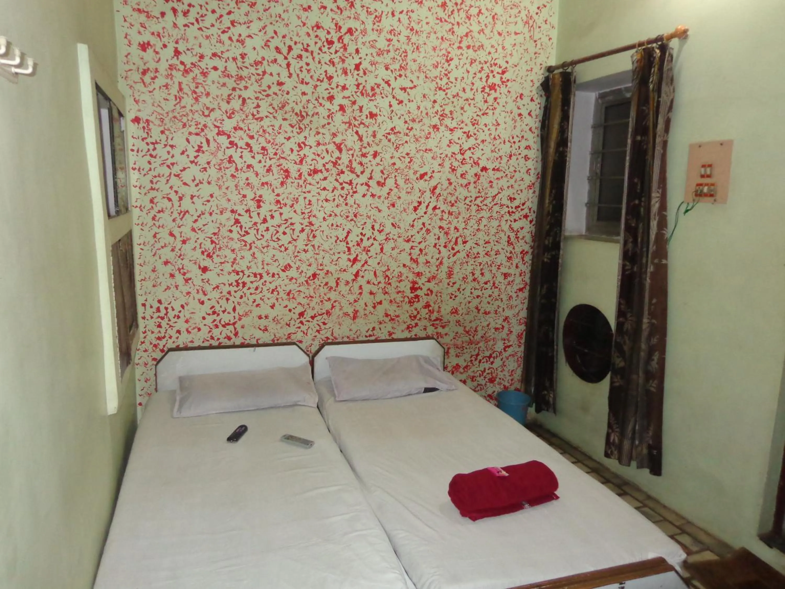 Photo of the whole room, Bed in Luxmi Hotel