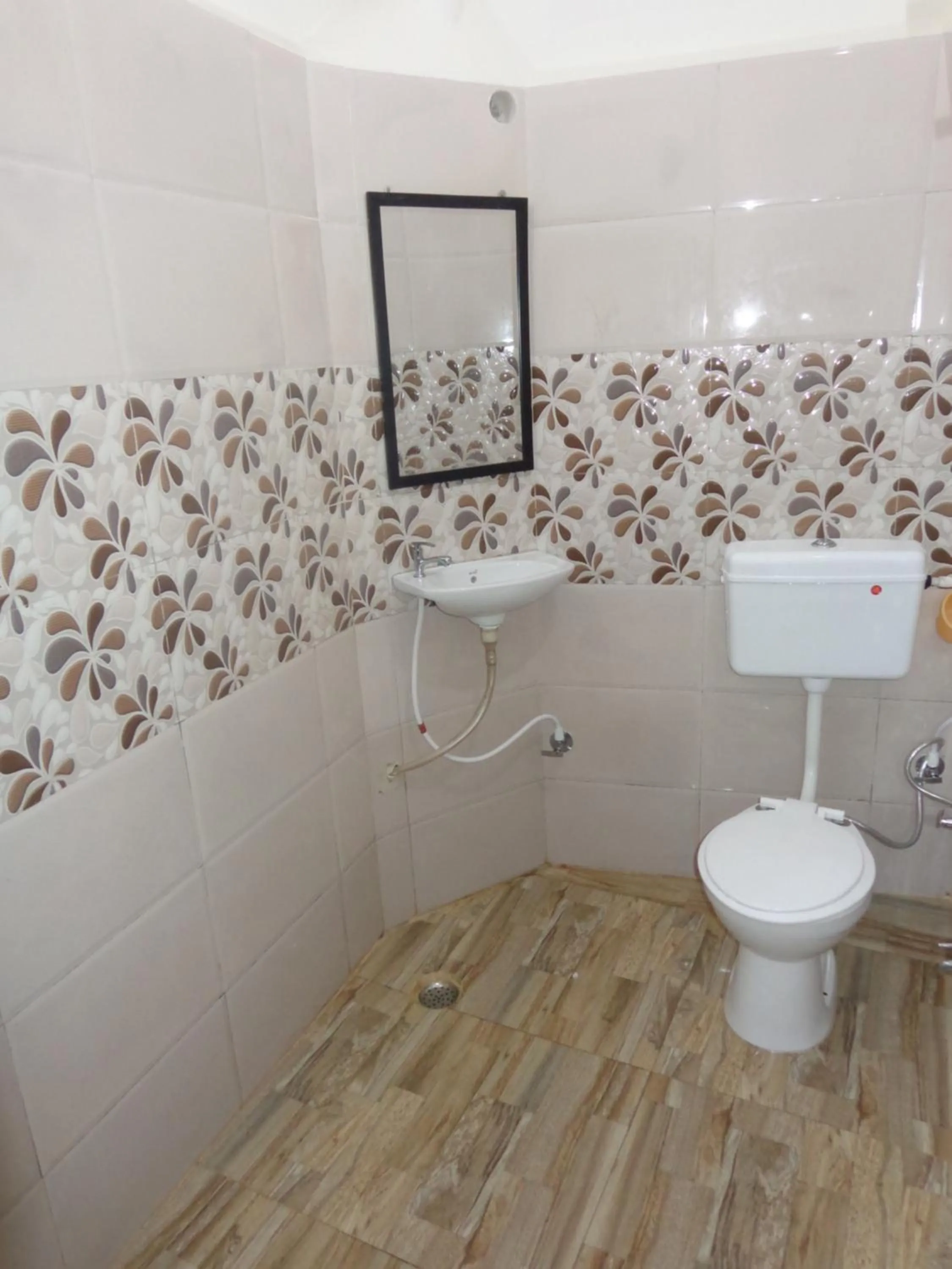 Toilet in Luxmi Hotel