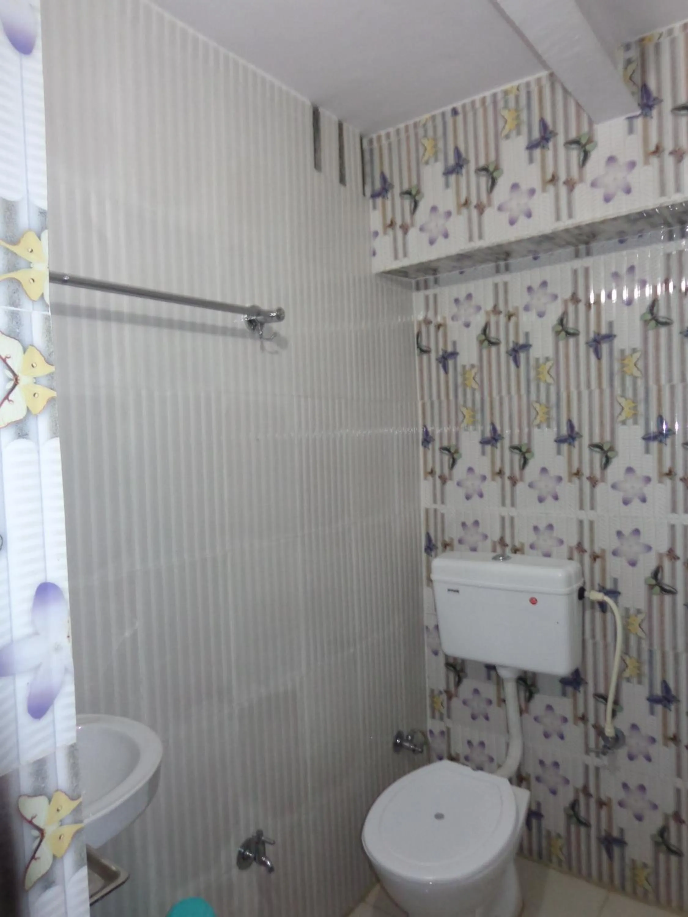 Bathroom in Luxmi Hotel