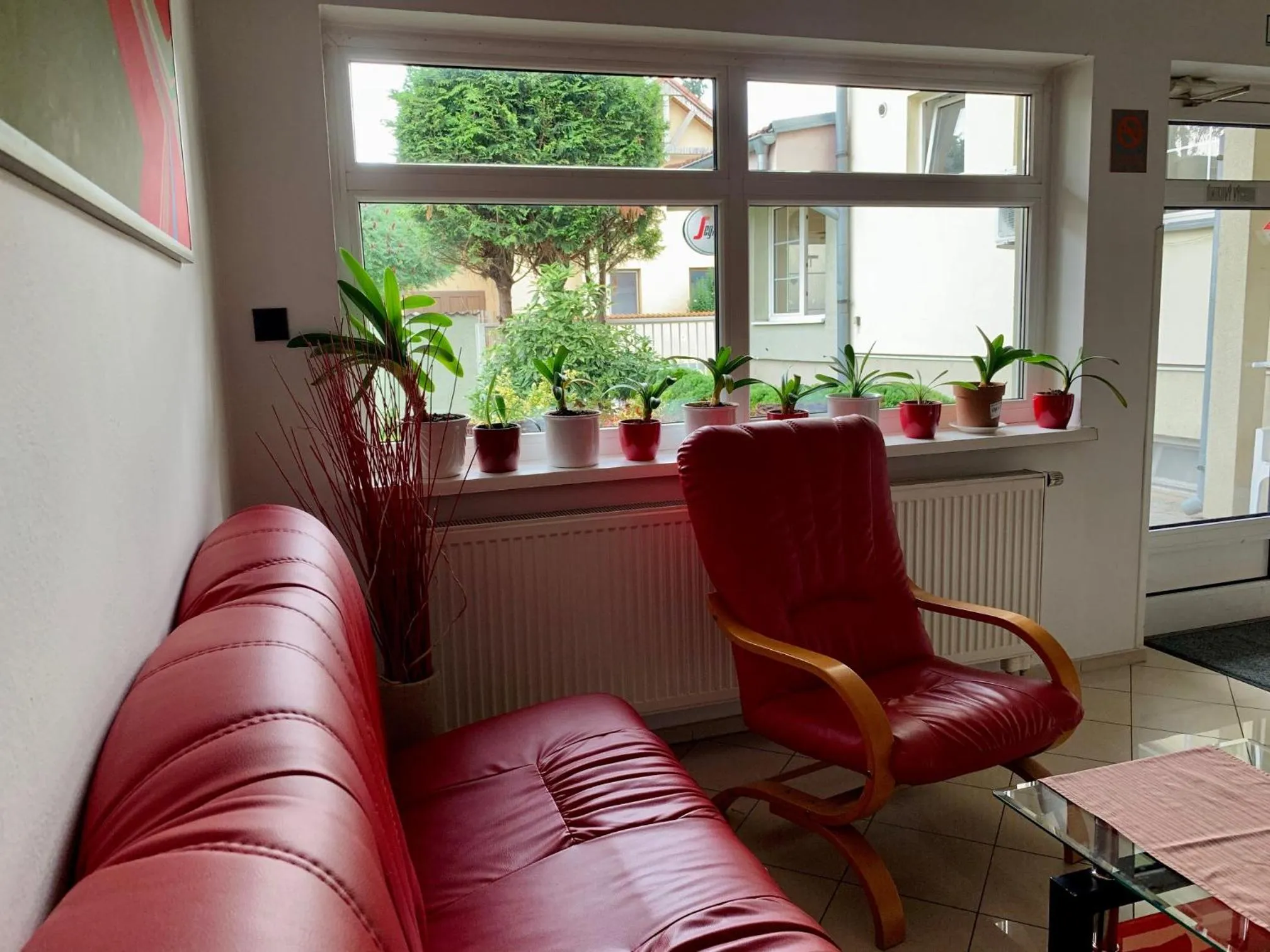 Communal lounge/ TV room in Hotel Orlan