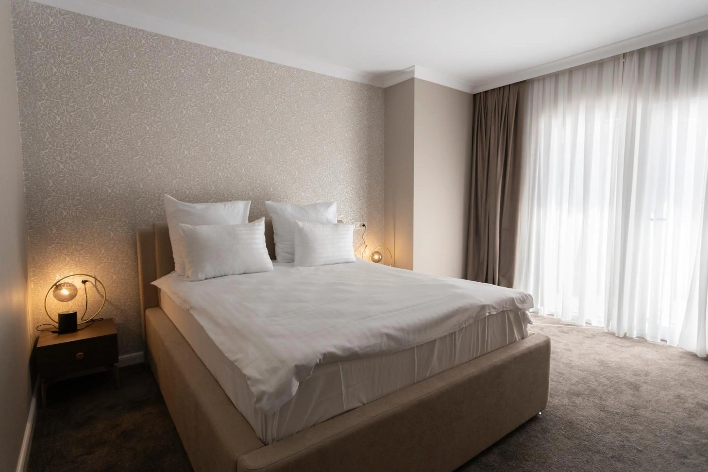 Bed in Ganzo Boutique Hotel