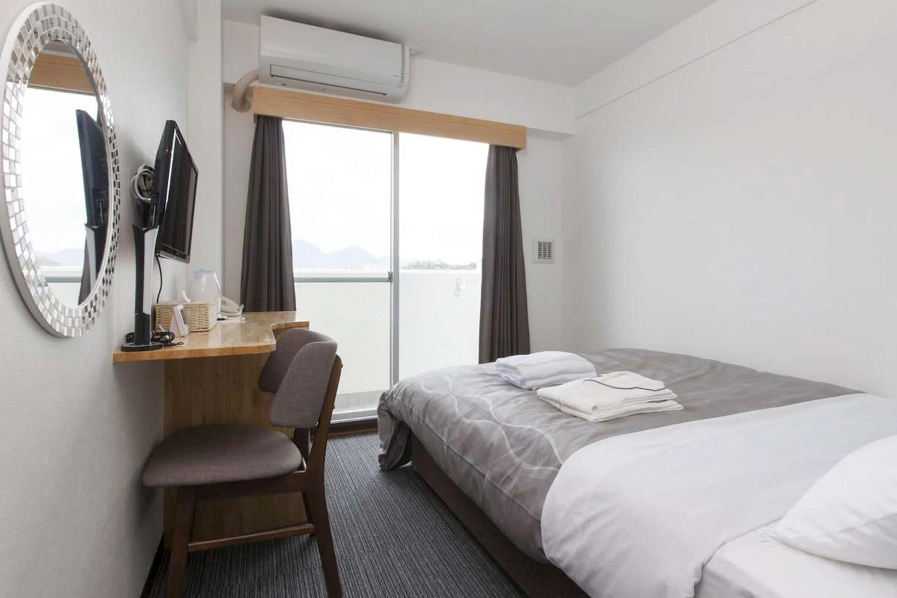 Bed in Global Resort Miyajima View