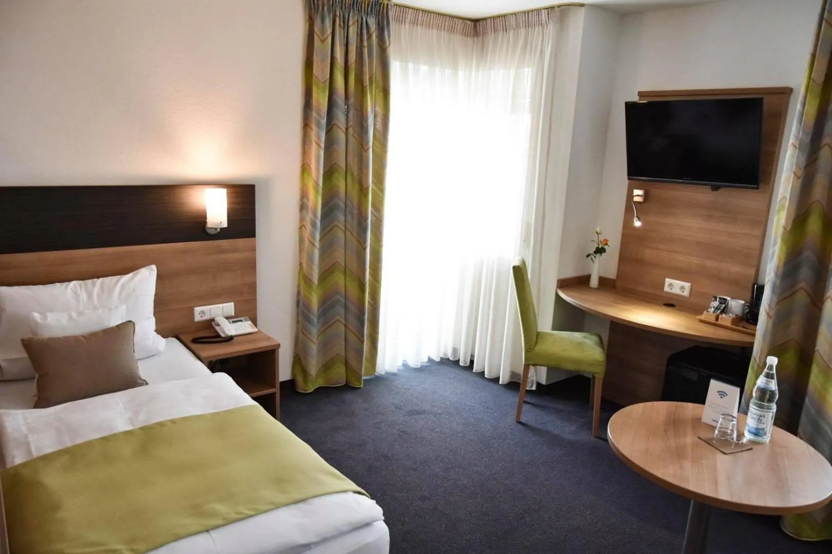Photo of the whole room, Bed in Martins Klause Airport Messe Hotel - Self Check-In