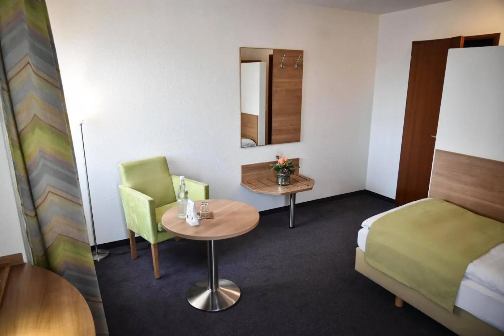 Photo of the whole room, Bed in Martins Klause Airport Messe Hotel - Self Check-In
