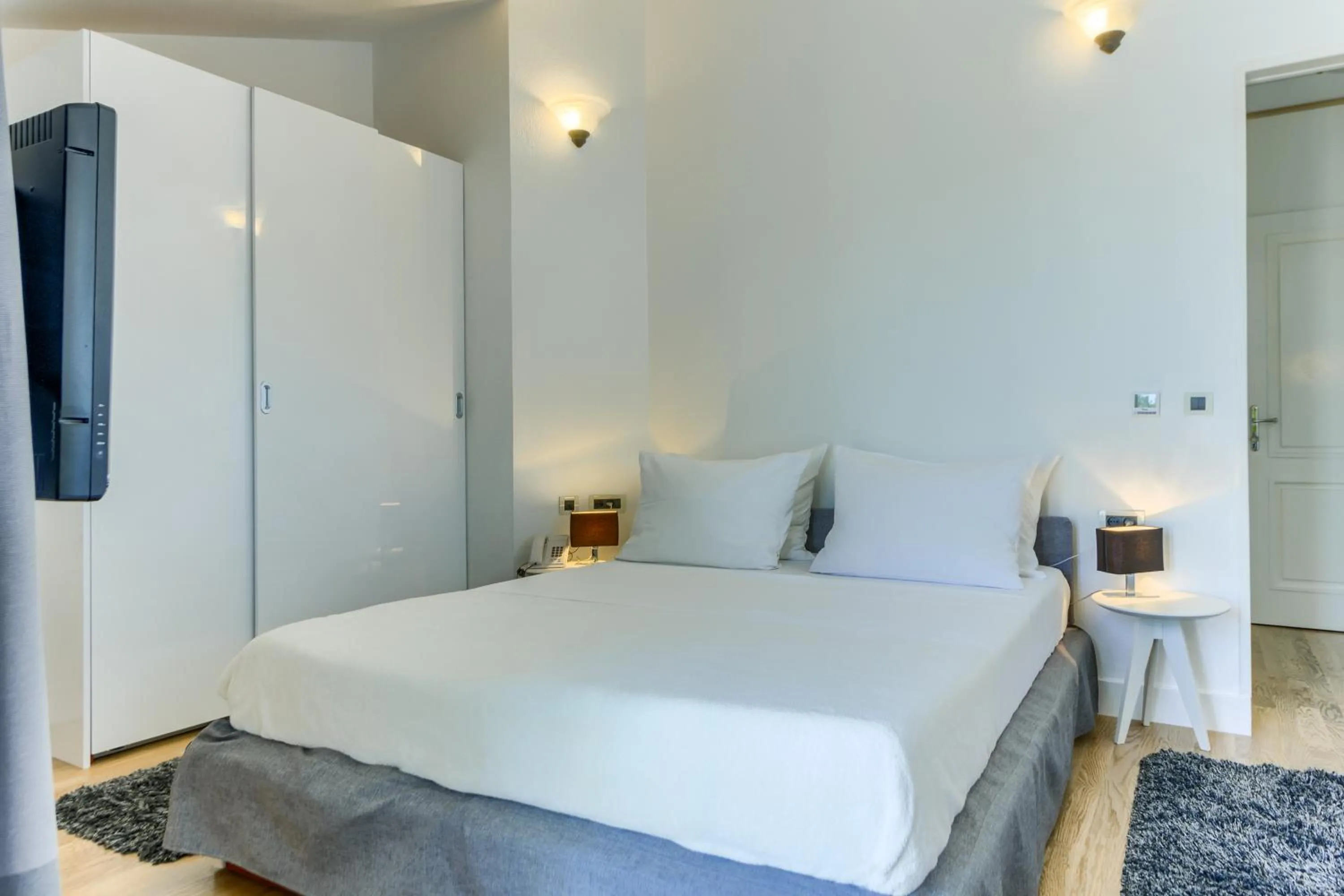 Bed in Hotel Riva Kaštela with swimming pool