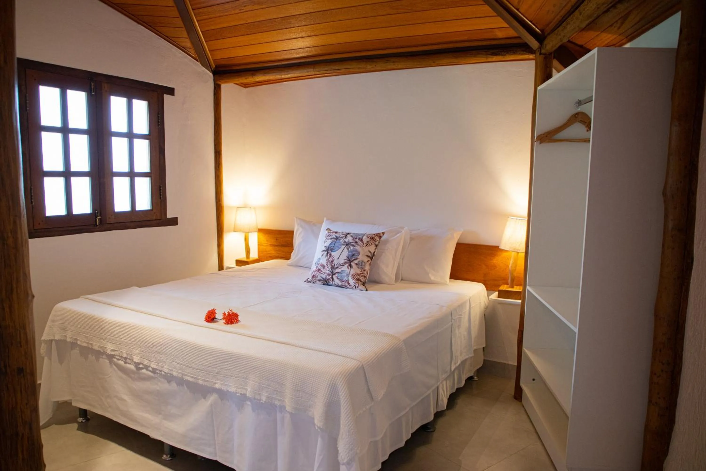 Bed in Tororao Hotel Pousada