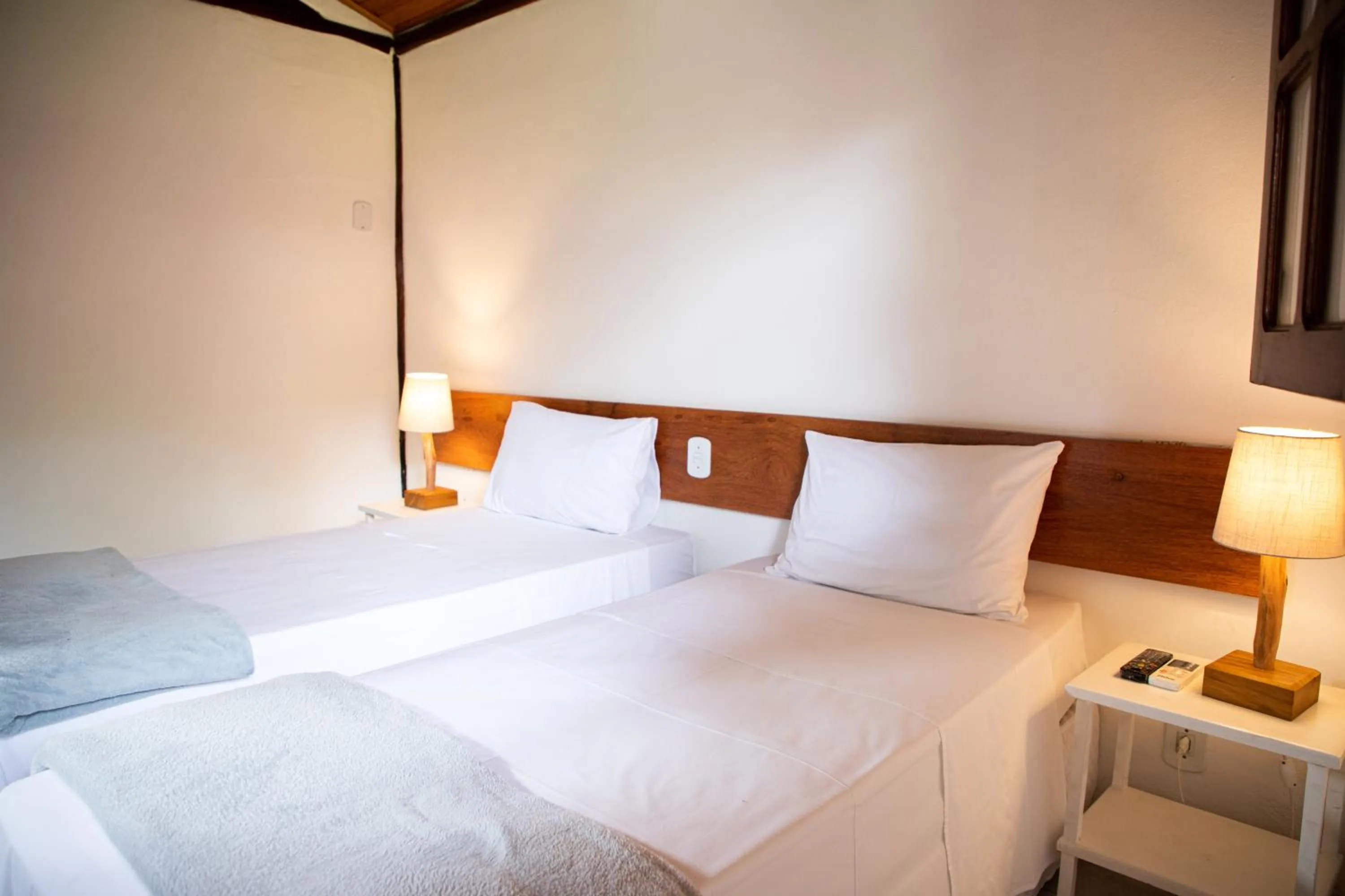 Bed in Tororao Hotel Pousada