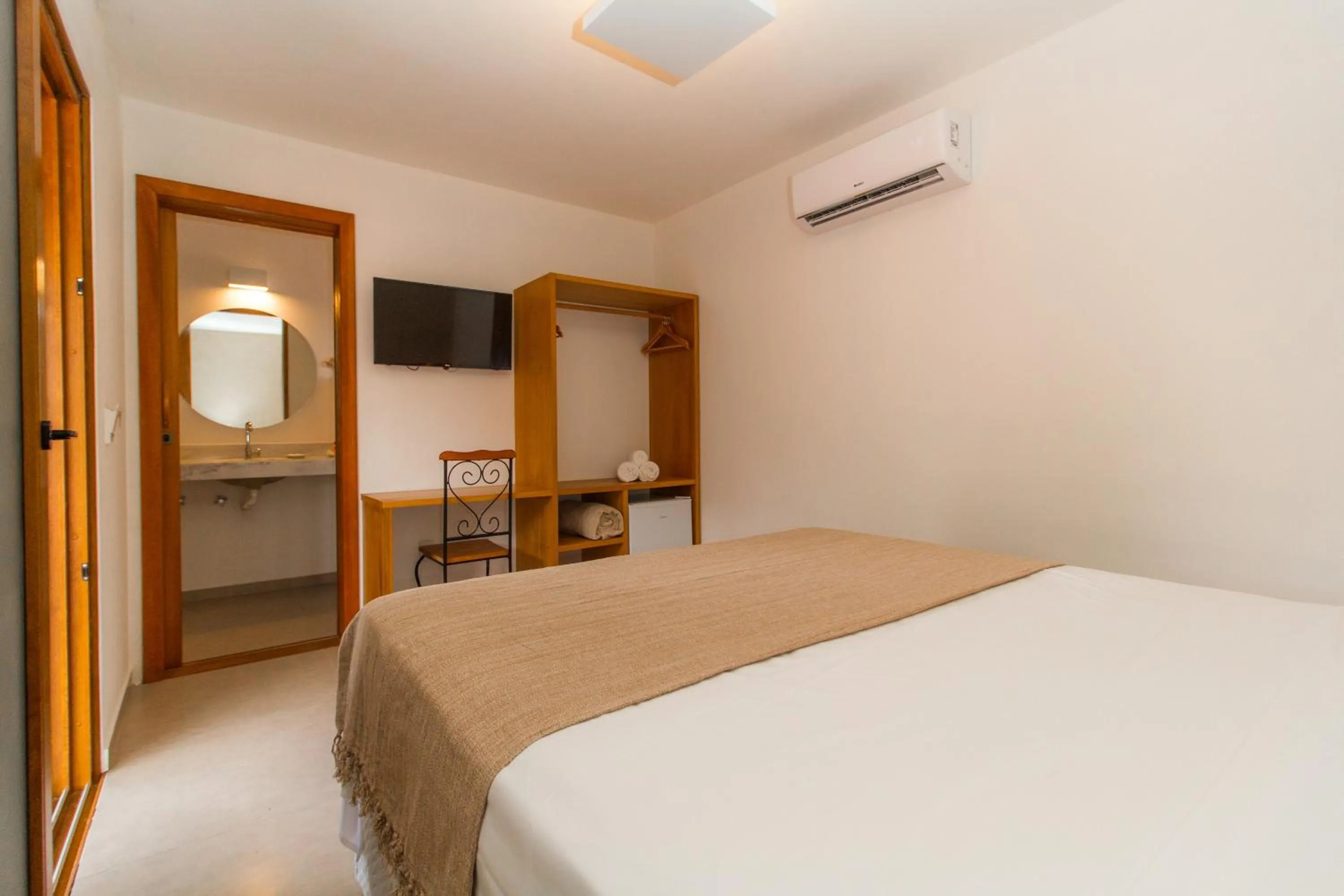 Bed in Tororao Hotel Pousada