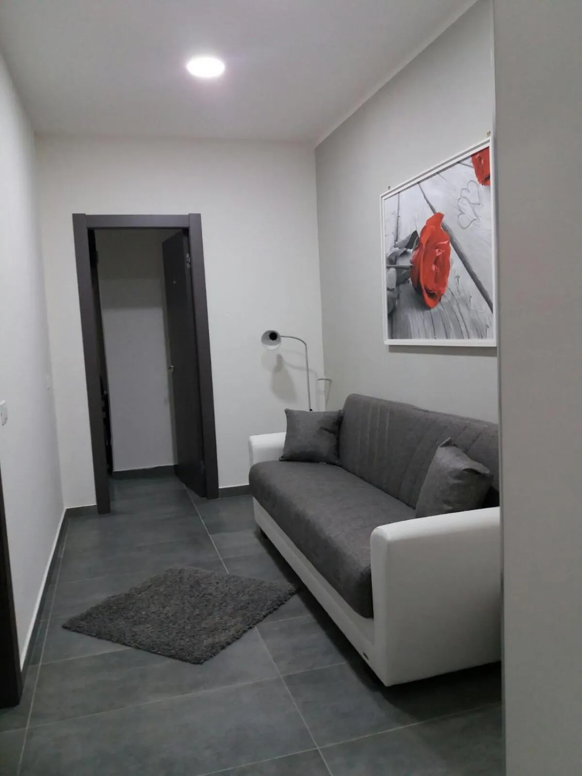 Communal lounge/ TV room in B&B La Grotta