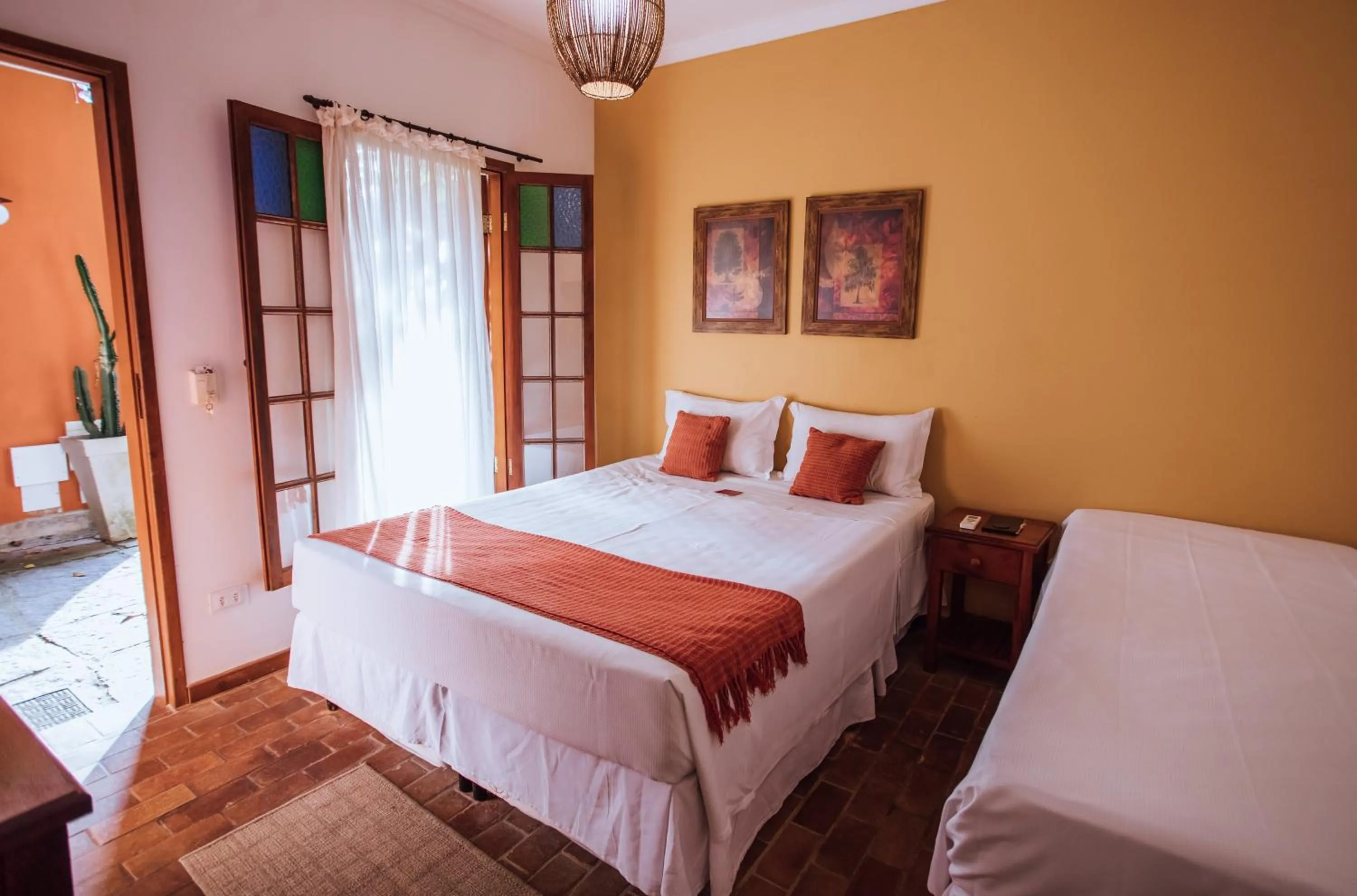 Bed in Pousada Terra Madre