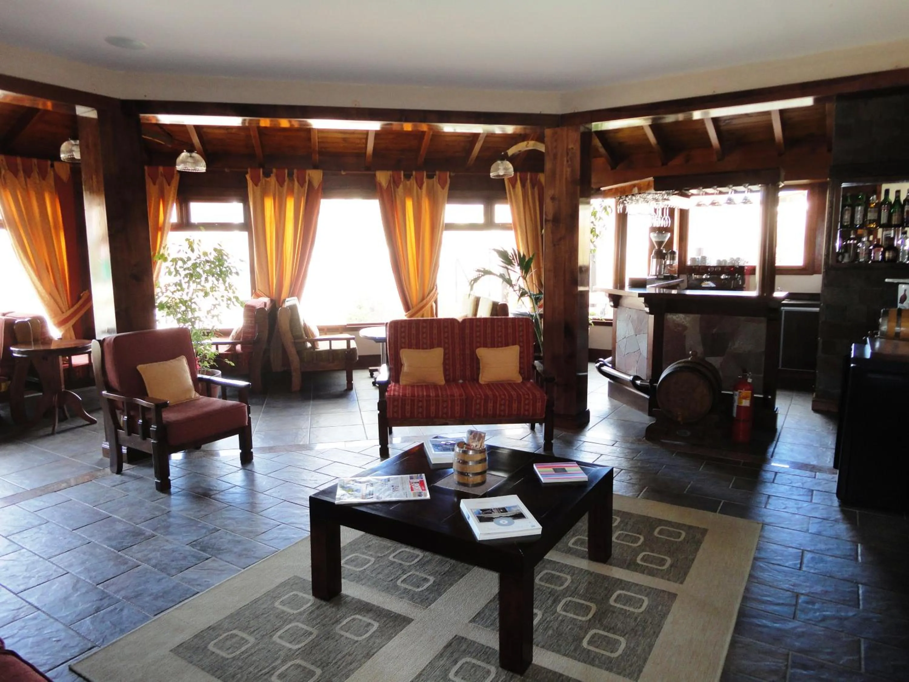 Communal lounge/ TV room in Patagonia Queen Hotel Boutique