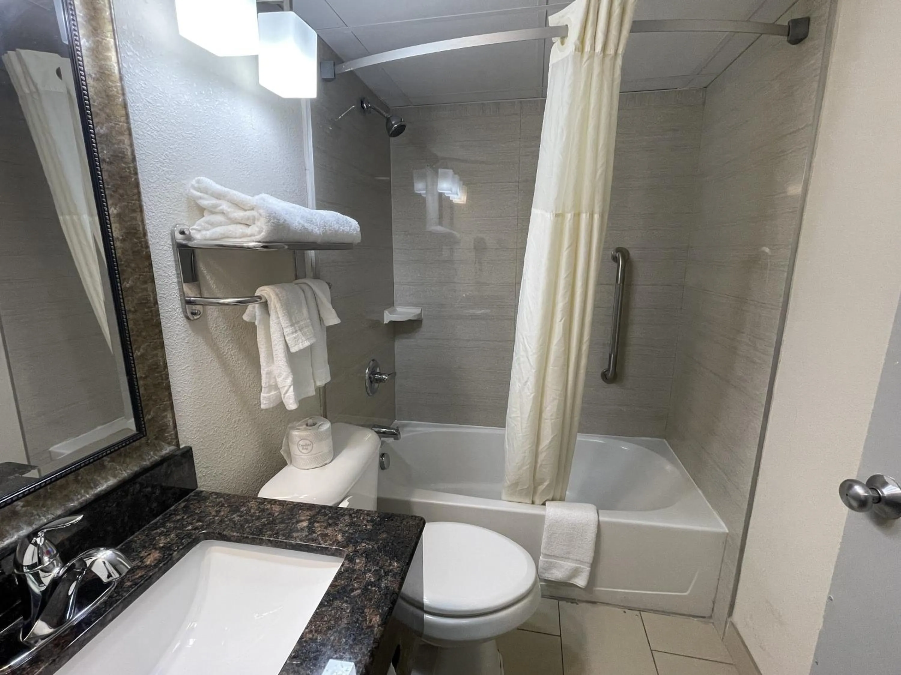 Toilet in Quality Inn & Suites Cincinnati Downtown Area