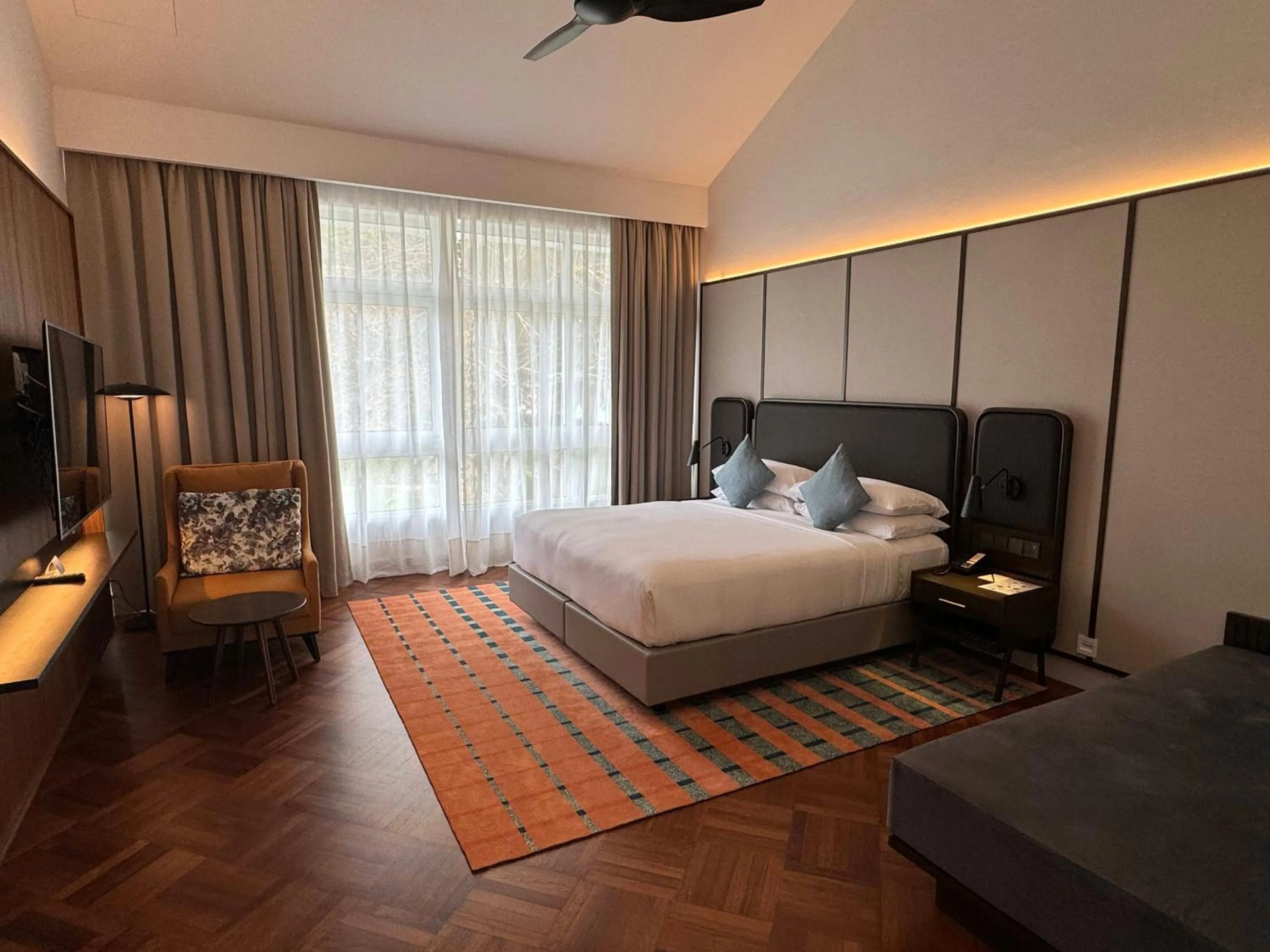 Bed in Lone Pine, Penang, a Tribute Portfolio Resort