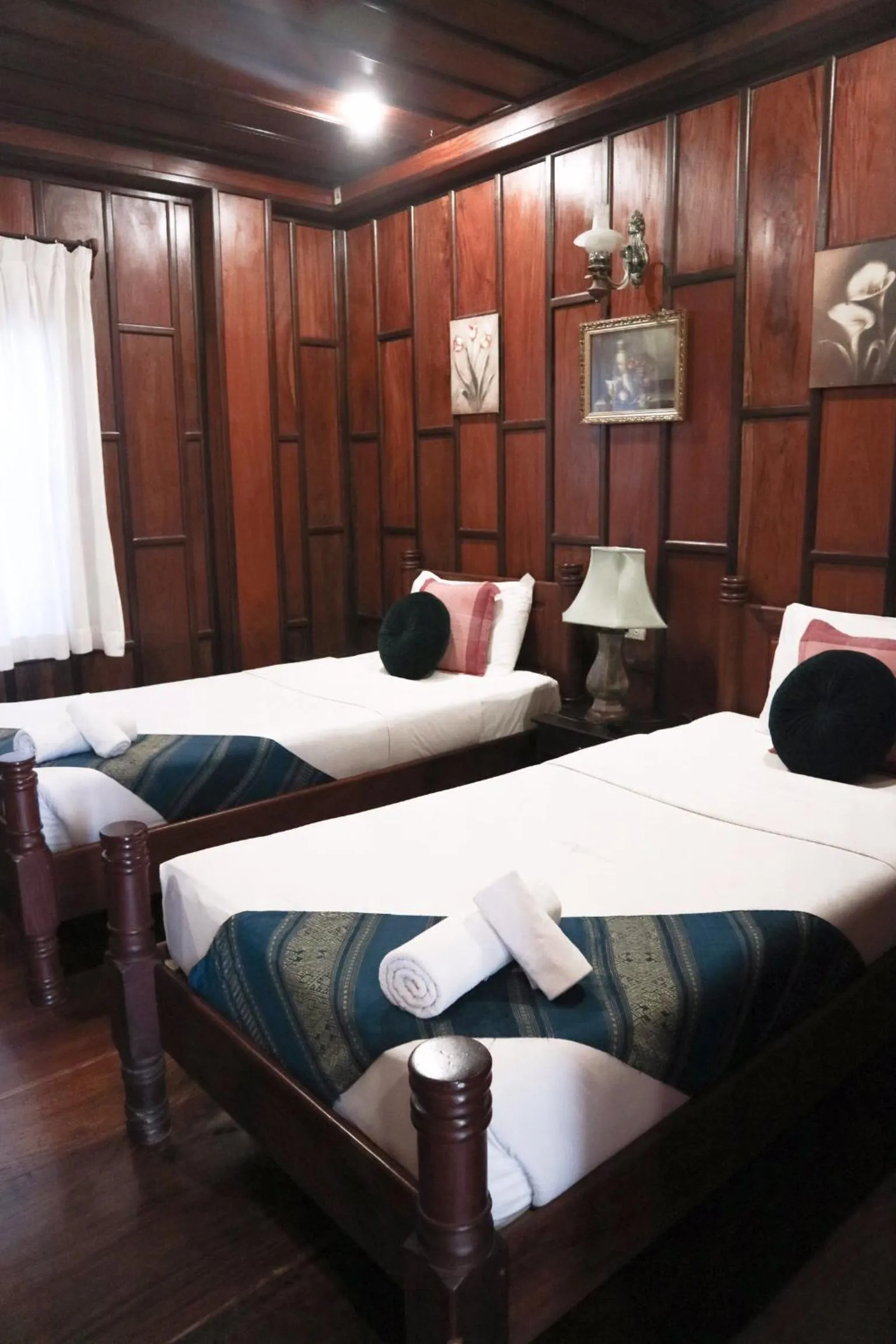 Bed in Villa Senesouk Luang Prabang