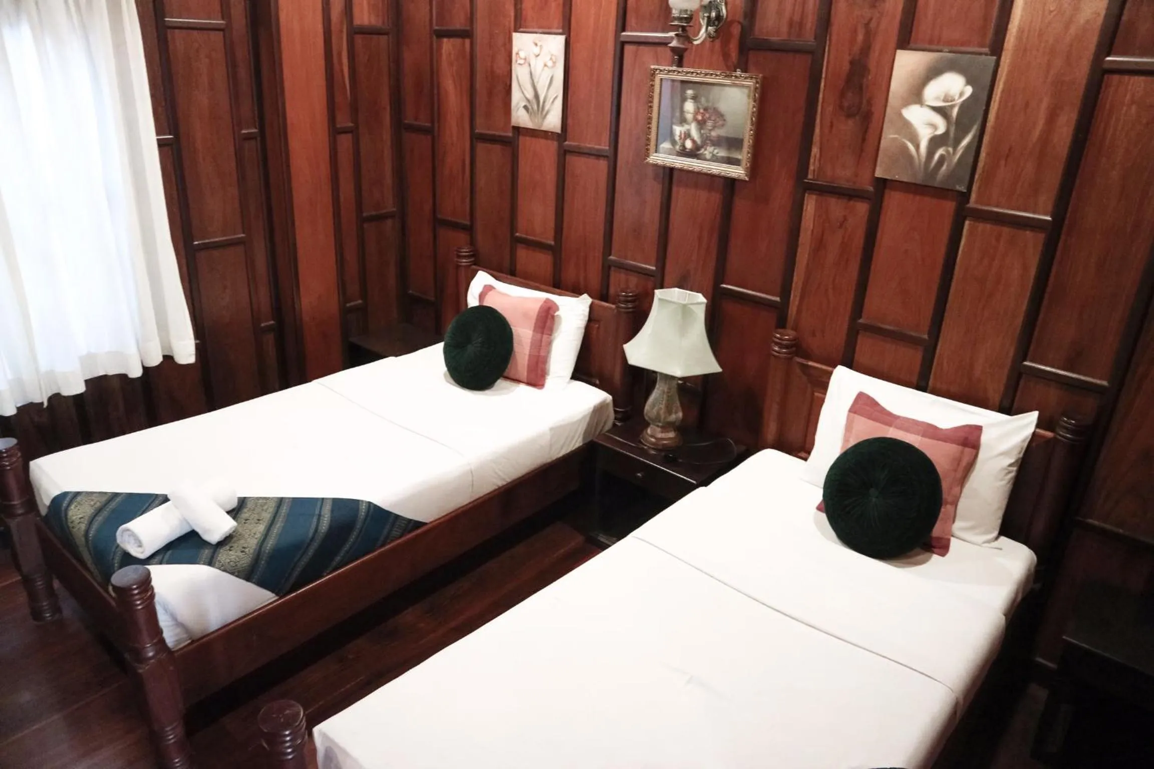 Bed in Villa Senesouk Luang Prabang