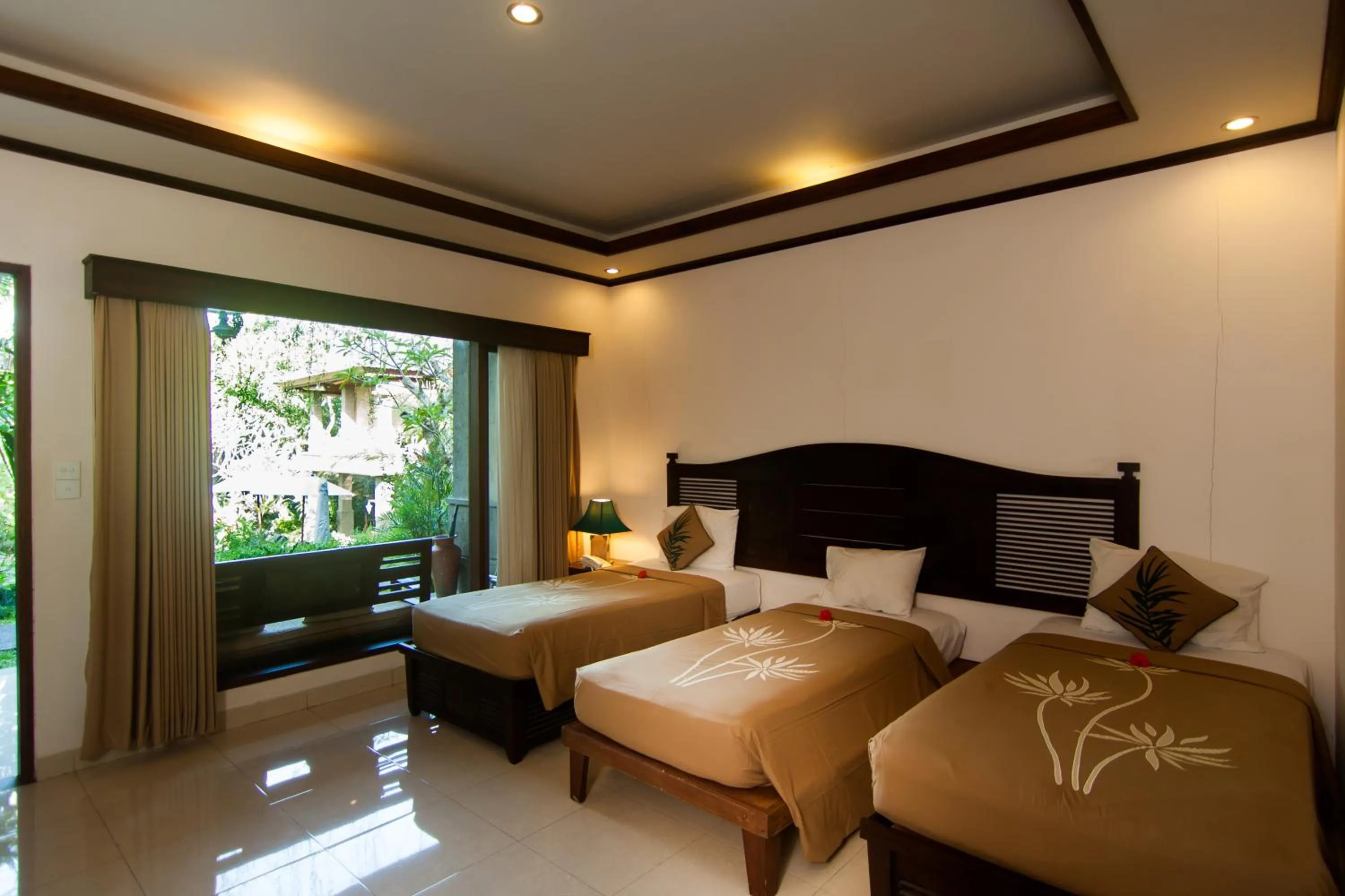 Bed in De Munut Balinese Resort