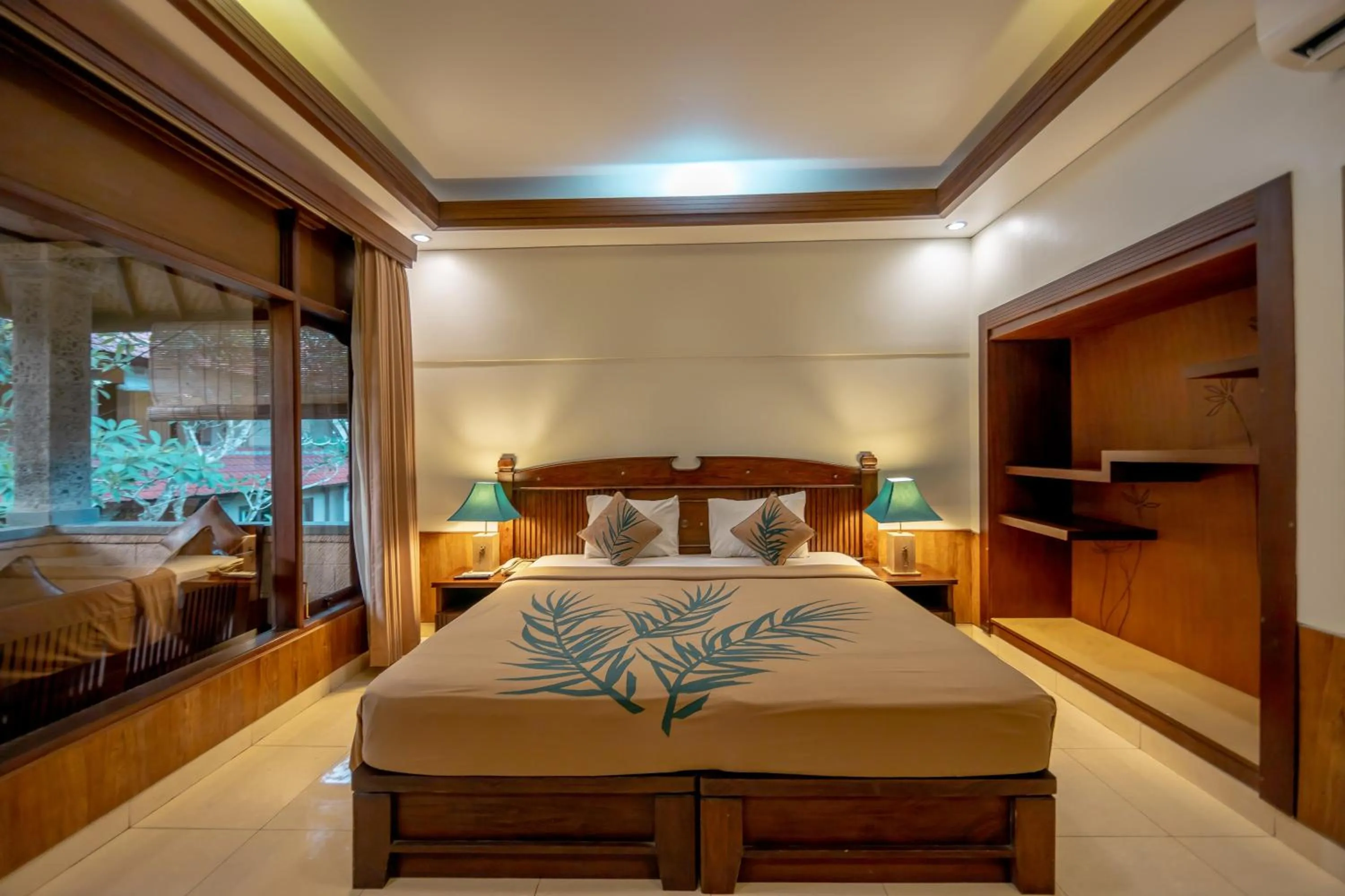 Bed in De Munut Balinese Resort