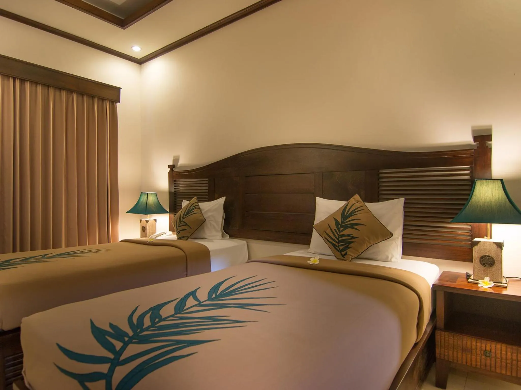 Bed in De Munut Balinese Resort