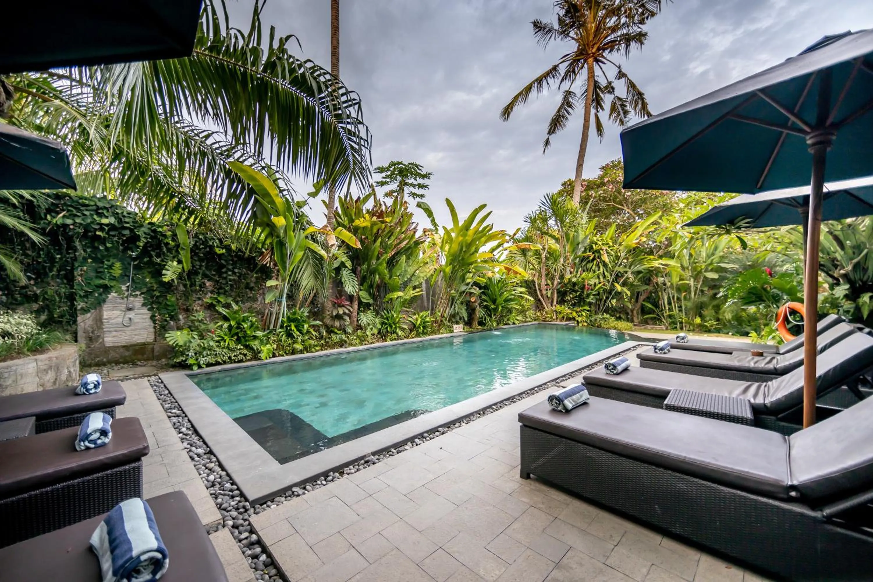 Swimming pool in De Munut Balinese Resort