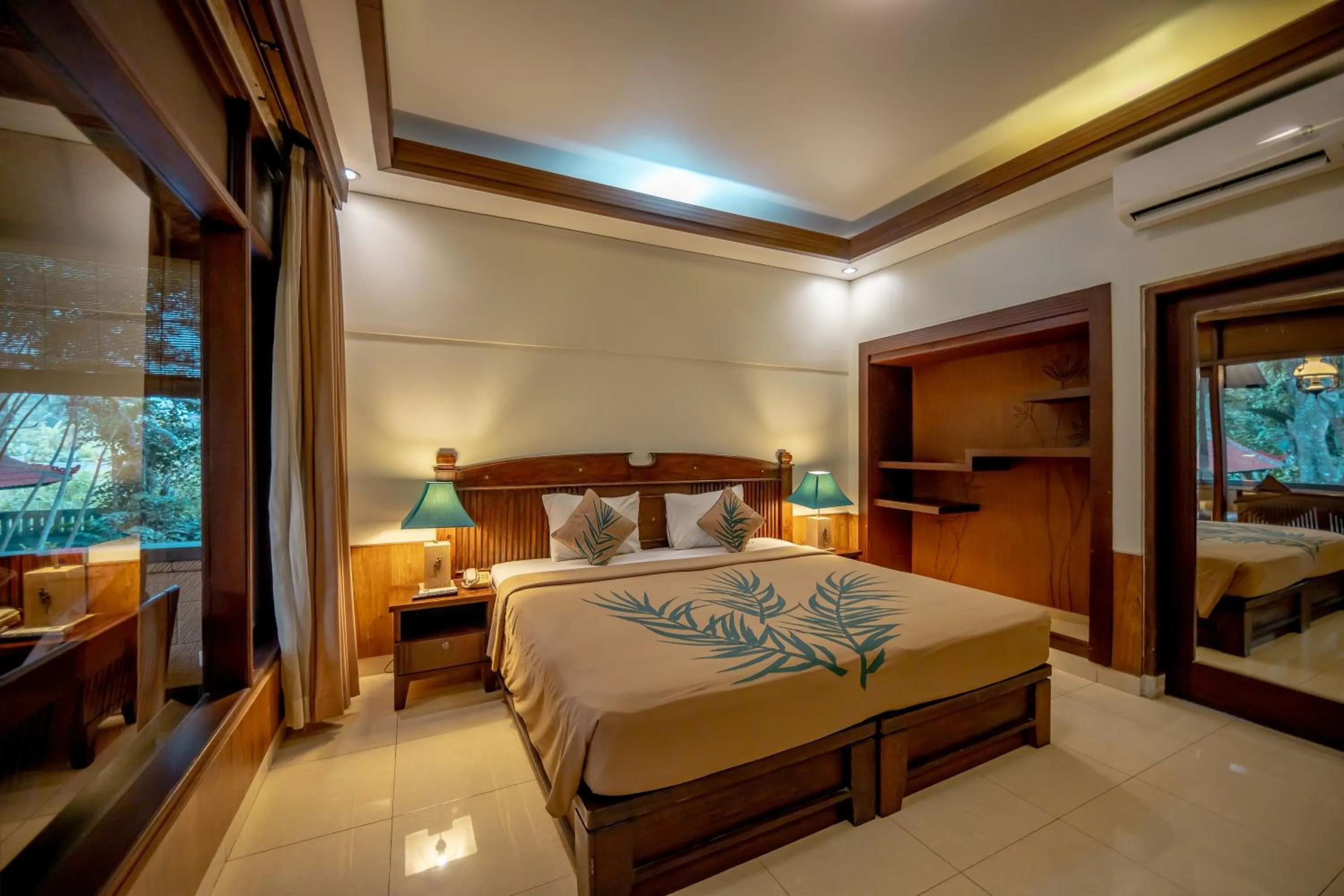 Bed in De Munut Balinese Resort