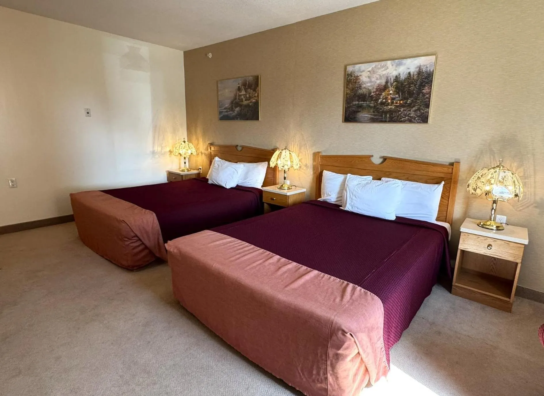 Bed in Western Budget Motel Ponoka