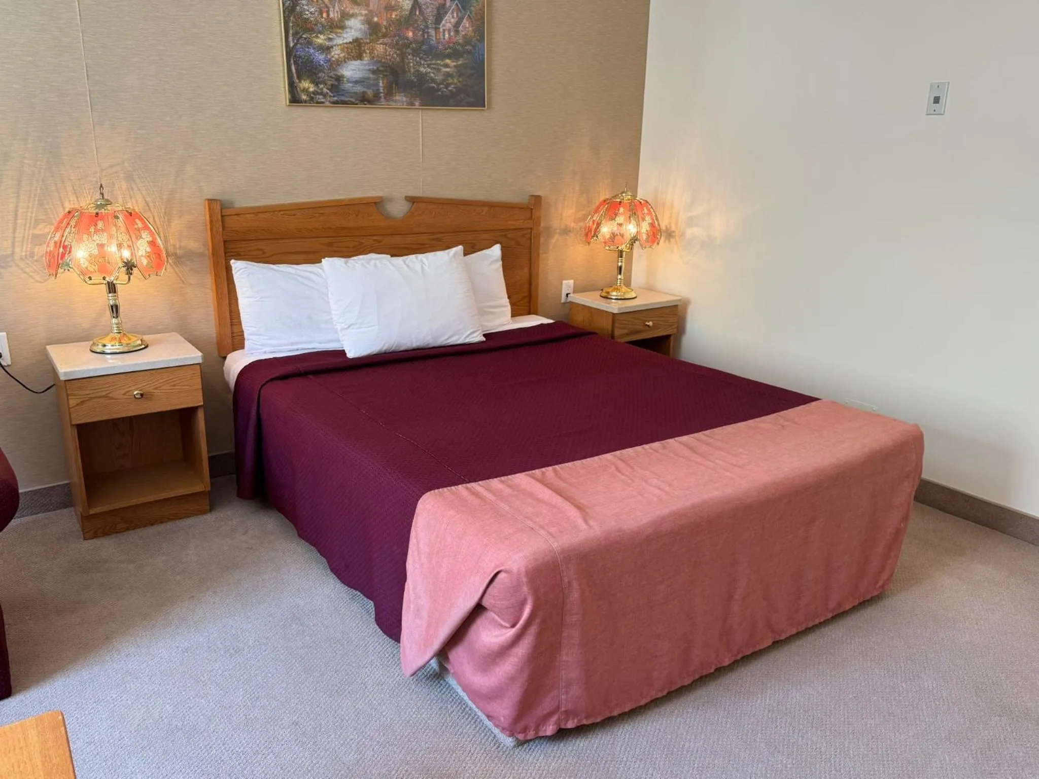 Bed in Western Budget Motel Ponoka