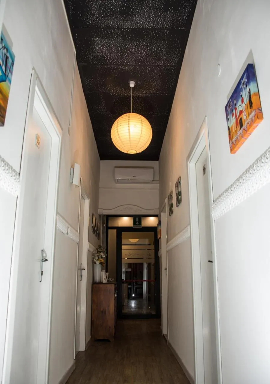 Communal lounge/ TV room in Hotel Le Orchidee