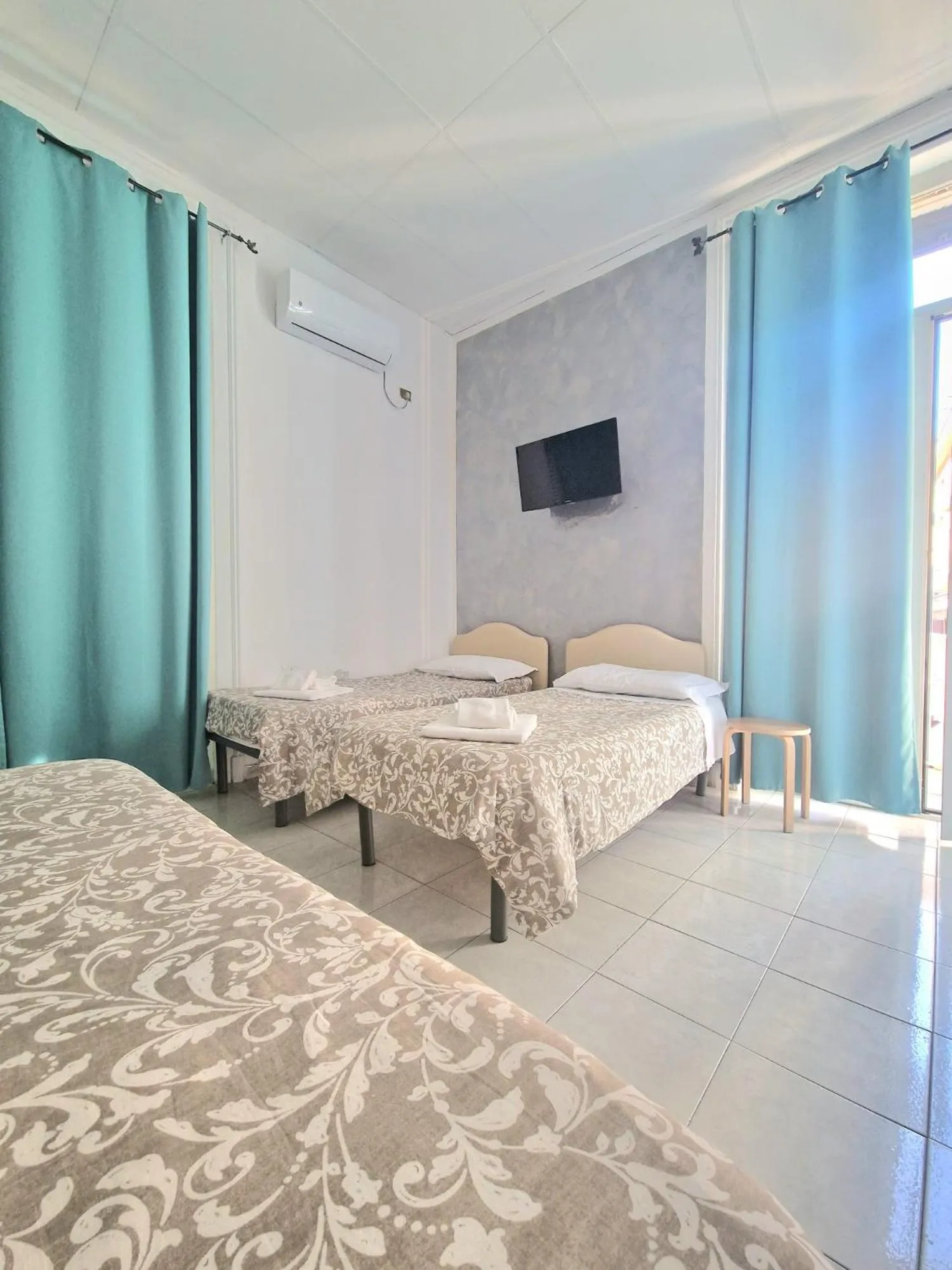 Bed in Hotel Le Orchidee