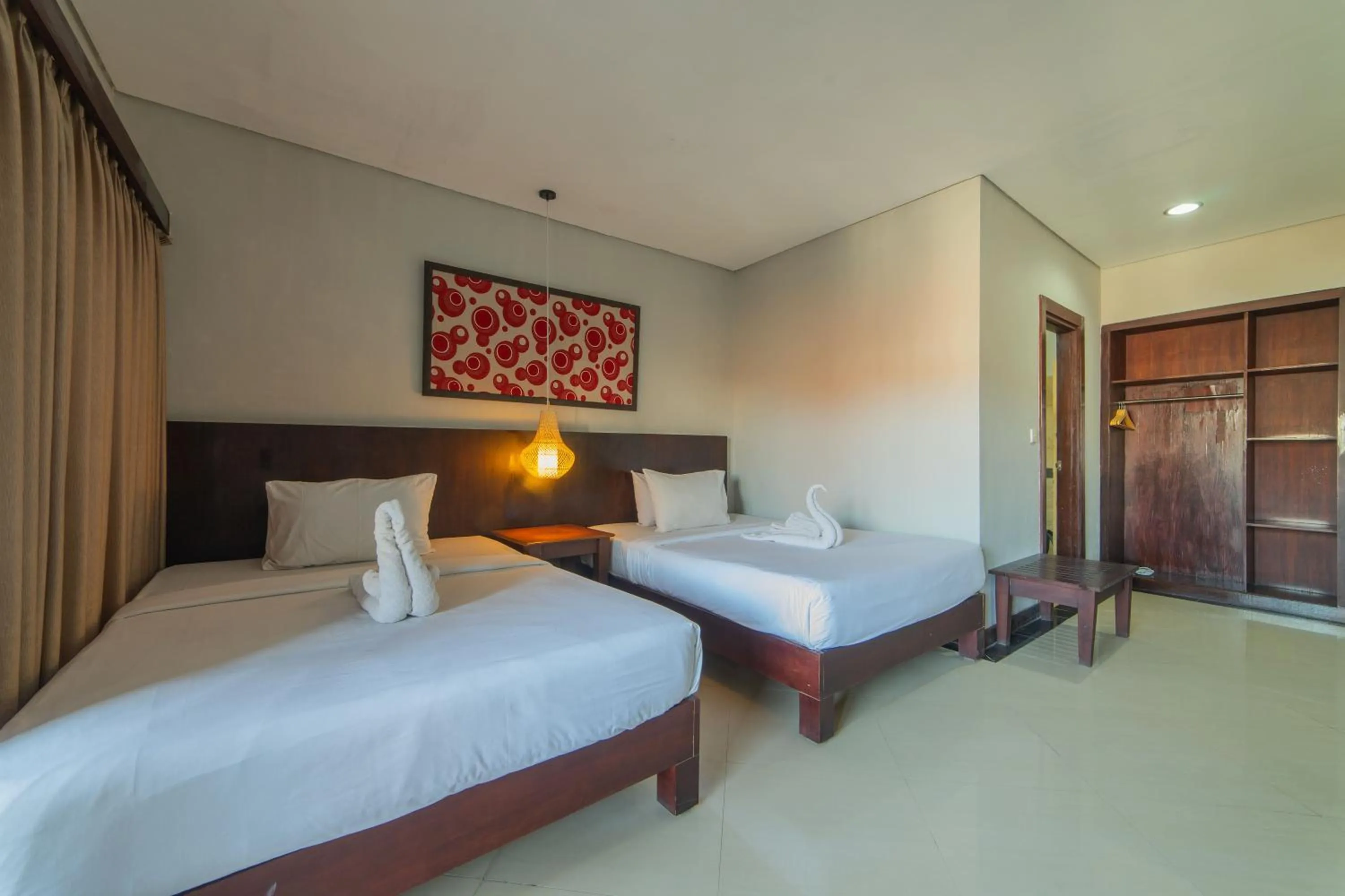 Bed in Nirmala Hotel Jimbaran