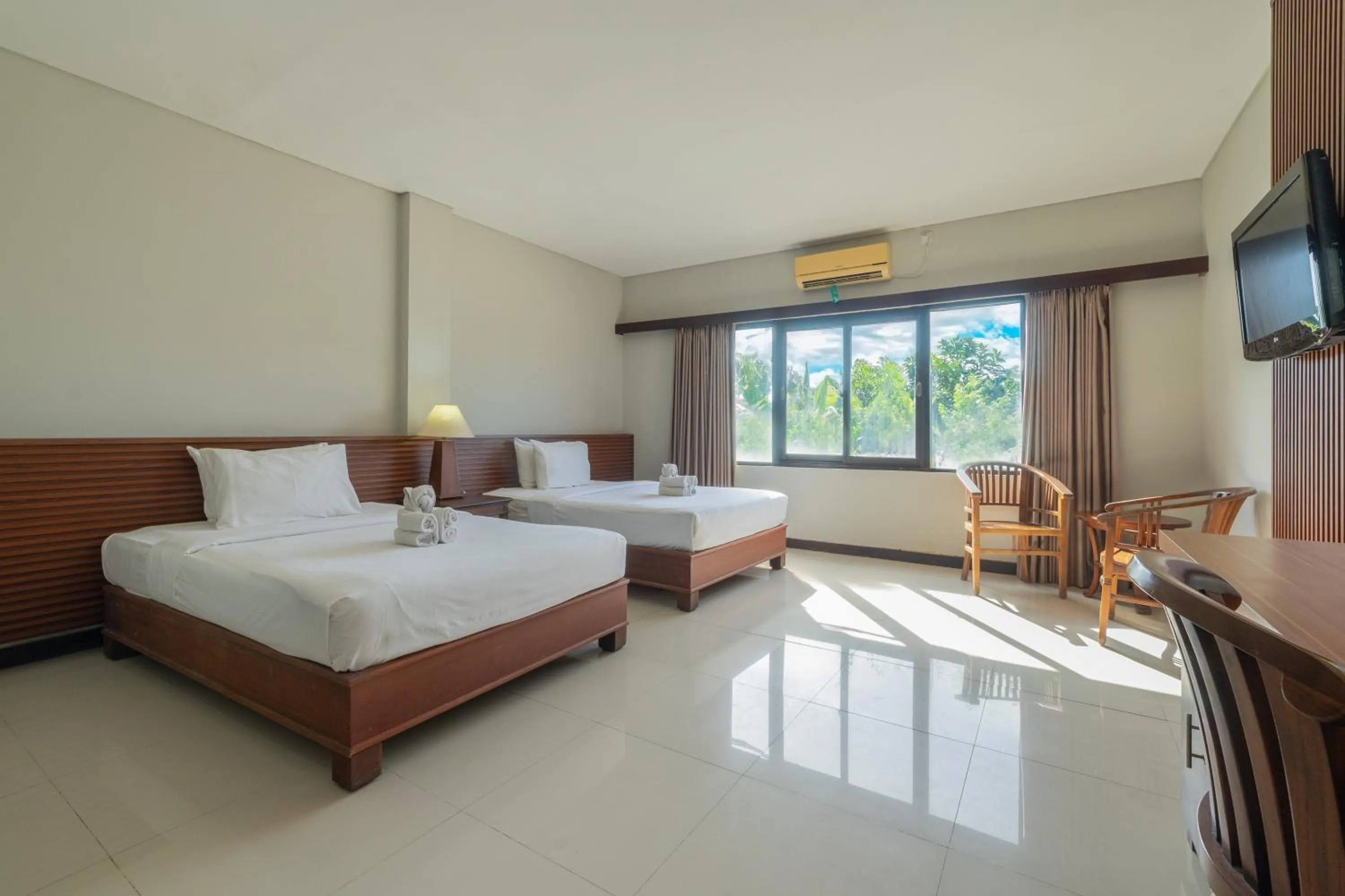 Bed in Nirmala Hotel Jimbaran