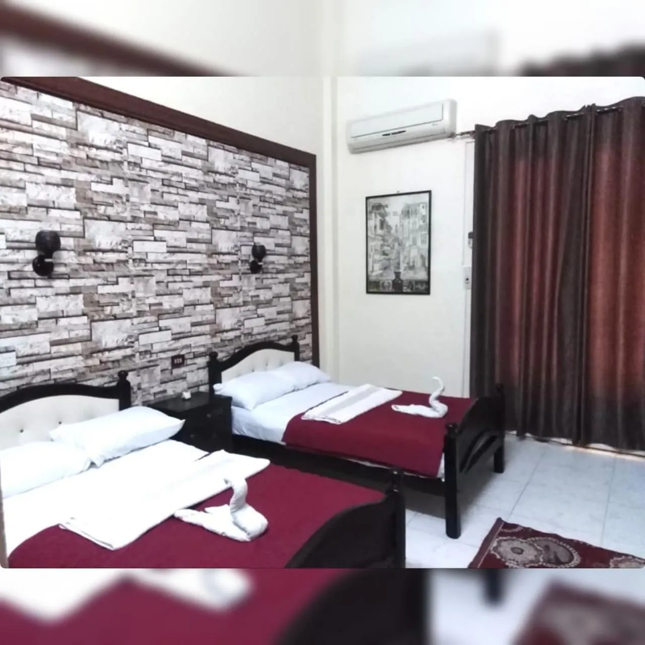 Bed in New Palace Hotel